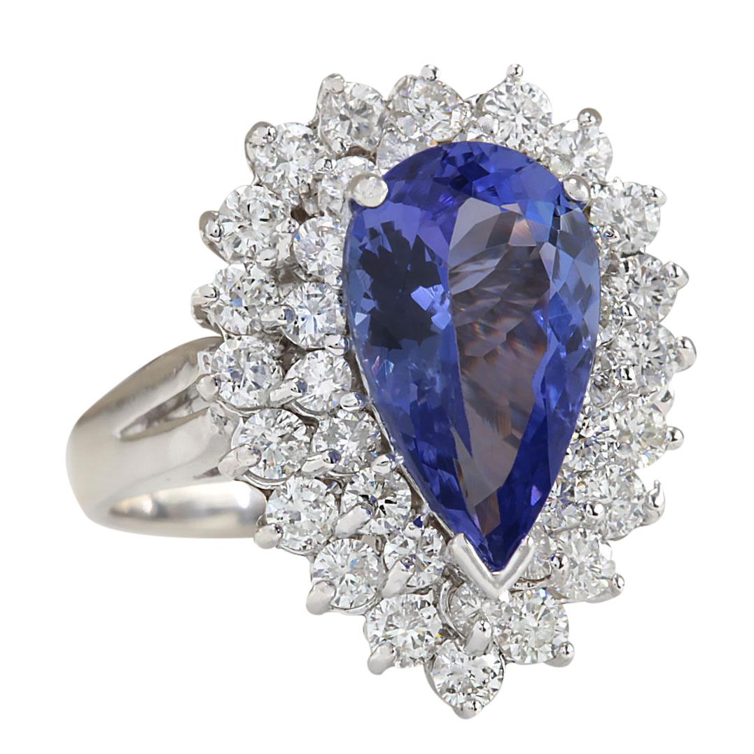 4.46 Carat Natural Tanzanite 14 Karat White Gold Diamond Ring
Stamped: 14K White Gold
Total Ring Weight: 7.0 Grams
Total Natural Tanzanite Weight is 3.06 Carat (Measures: 13.90x8.00 mm)
Color: Blue
Total Natural Diamond Weight is 1.40 Carat
Color: