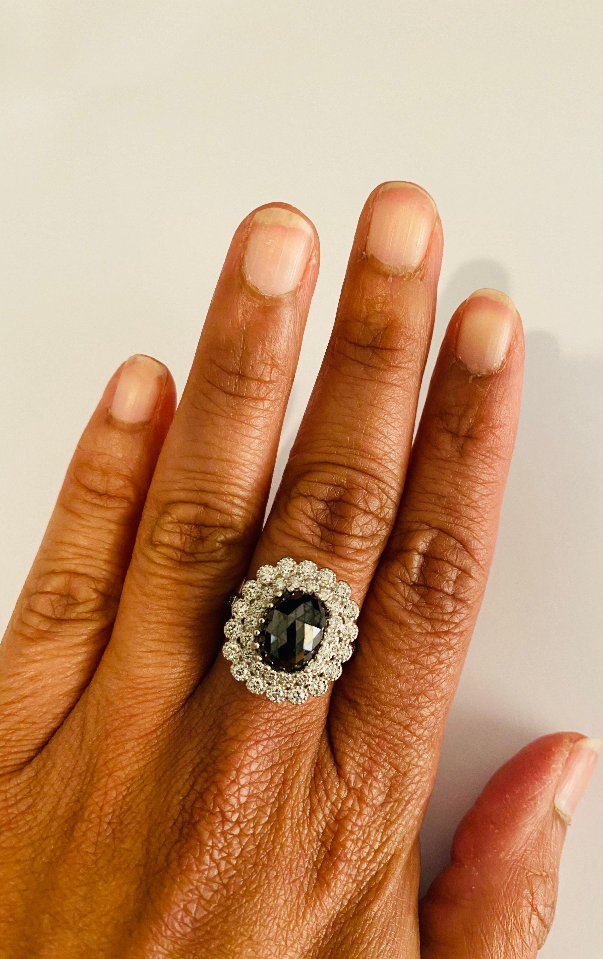Women's 4.46 Carat Oval Cut Black Diamond 14 Karat White Gold Engagement Ring For Sale