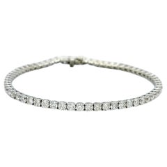 Bracciale tennis con diamanti tondi e brillanti da 4,46 carati totali in oro bianco 14 carati