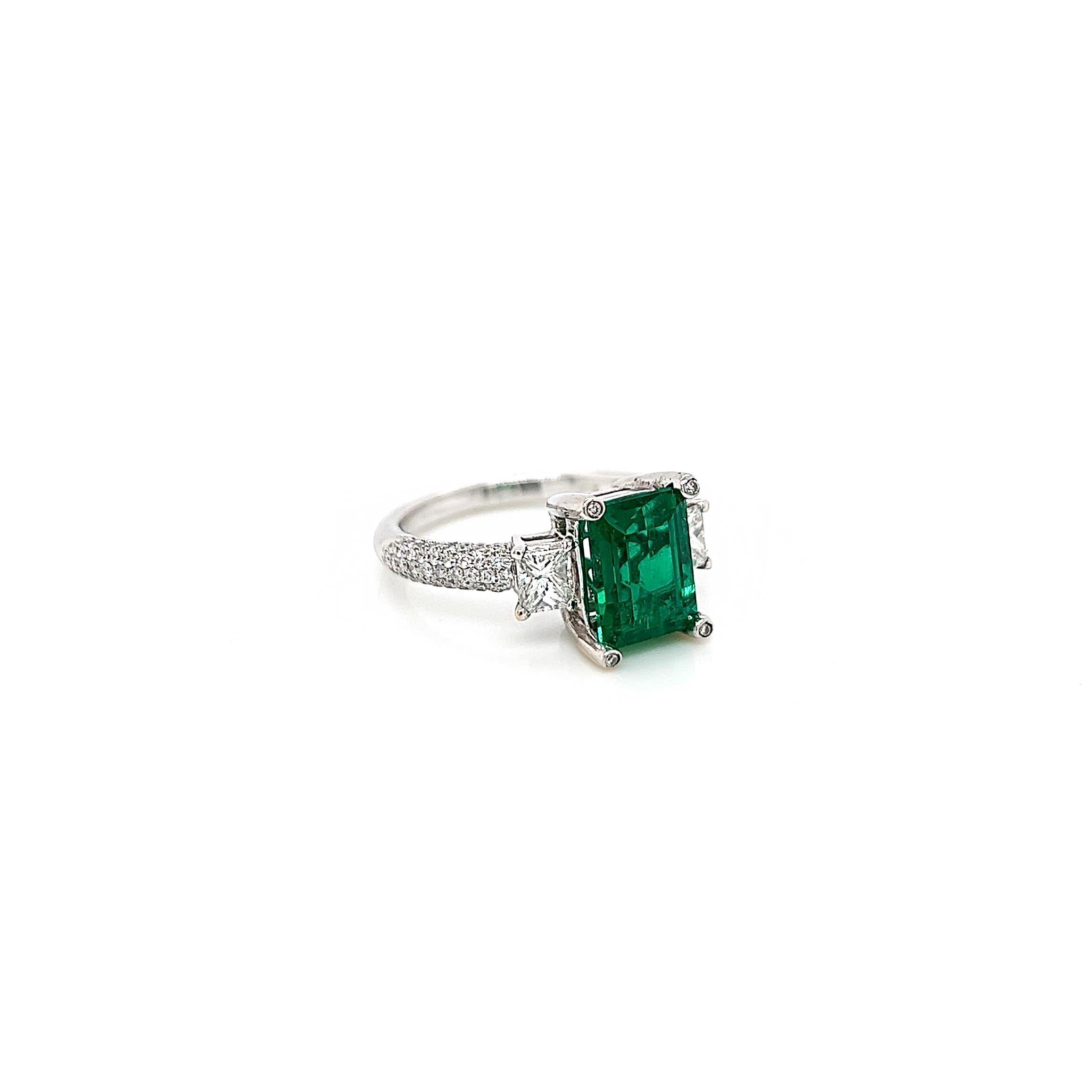 Emerald Cut 4.46 Total Carat Emerald and Diamond Three Stone Pave Set Engagement Ring, GIA For Sale