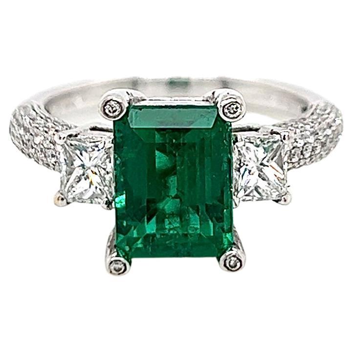 4.46 Total Carat Emerald and Diamond Three Stone Pave Set Engagement Ring, GIA For Sale