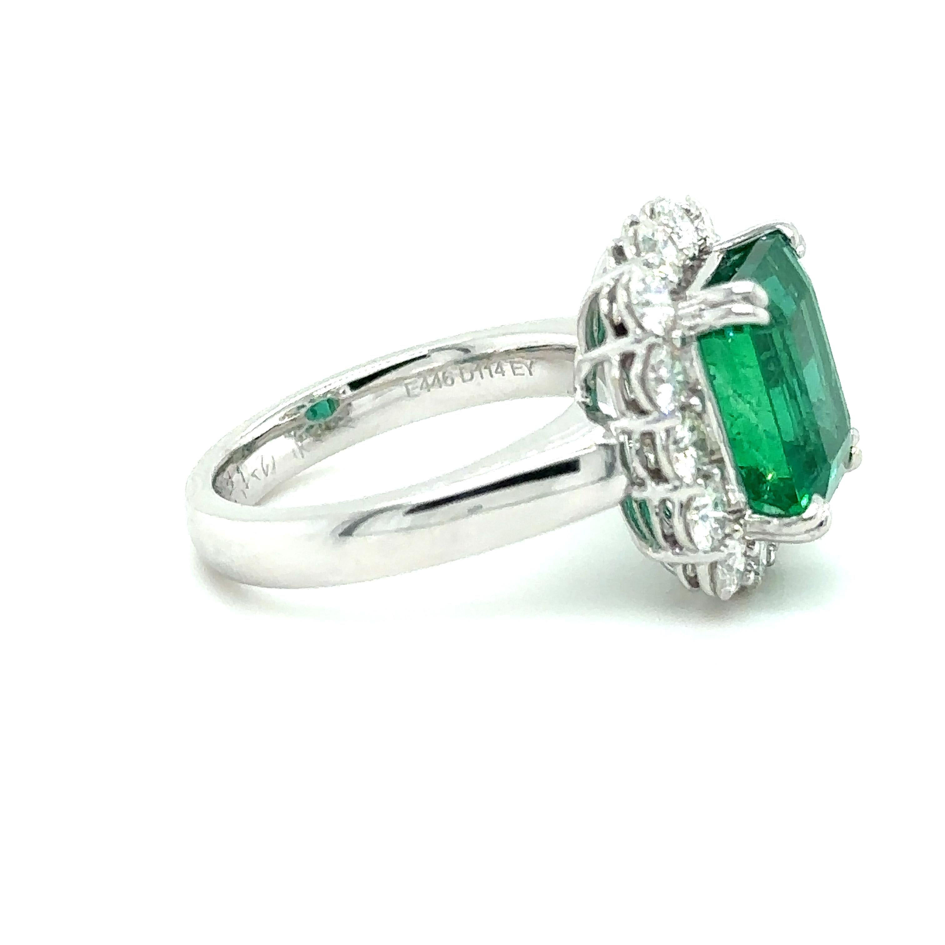 This timeless elegant ring is made from 18k white gold, featuring a stunning 4.46ct Emerald, which is the centerpiece of the design. The Emerald is graded intense to vivid green color, which is highly sought after in the world of gems and is a key