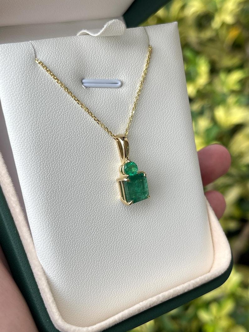 Modern 4.46tcw Emerald Toi et Moi Pendant  Zambian Emeralds 14K Gold Necklace For Sale