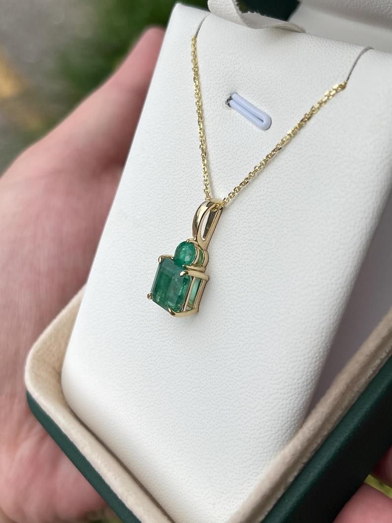 Emerald Cut 4.46tcw Emerald Toi et Moi Pendant  Zambian Emeralds 14K Gold Necklace For Sale