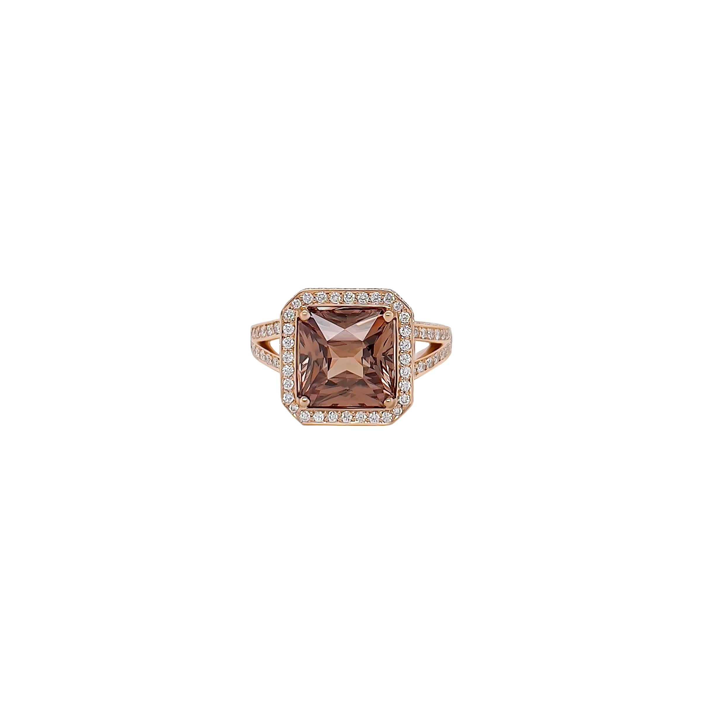 This  4.47ct princess cut natural brown zircon is surrounded by a pave'd diamond halo. Set in 18k Rose Gold, high quality F coloured Pave diamonds also decorate the band and shank in this intrigue, simple yet elegant design. 

Brown Zircon - 4.47cts