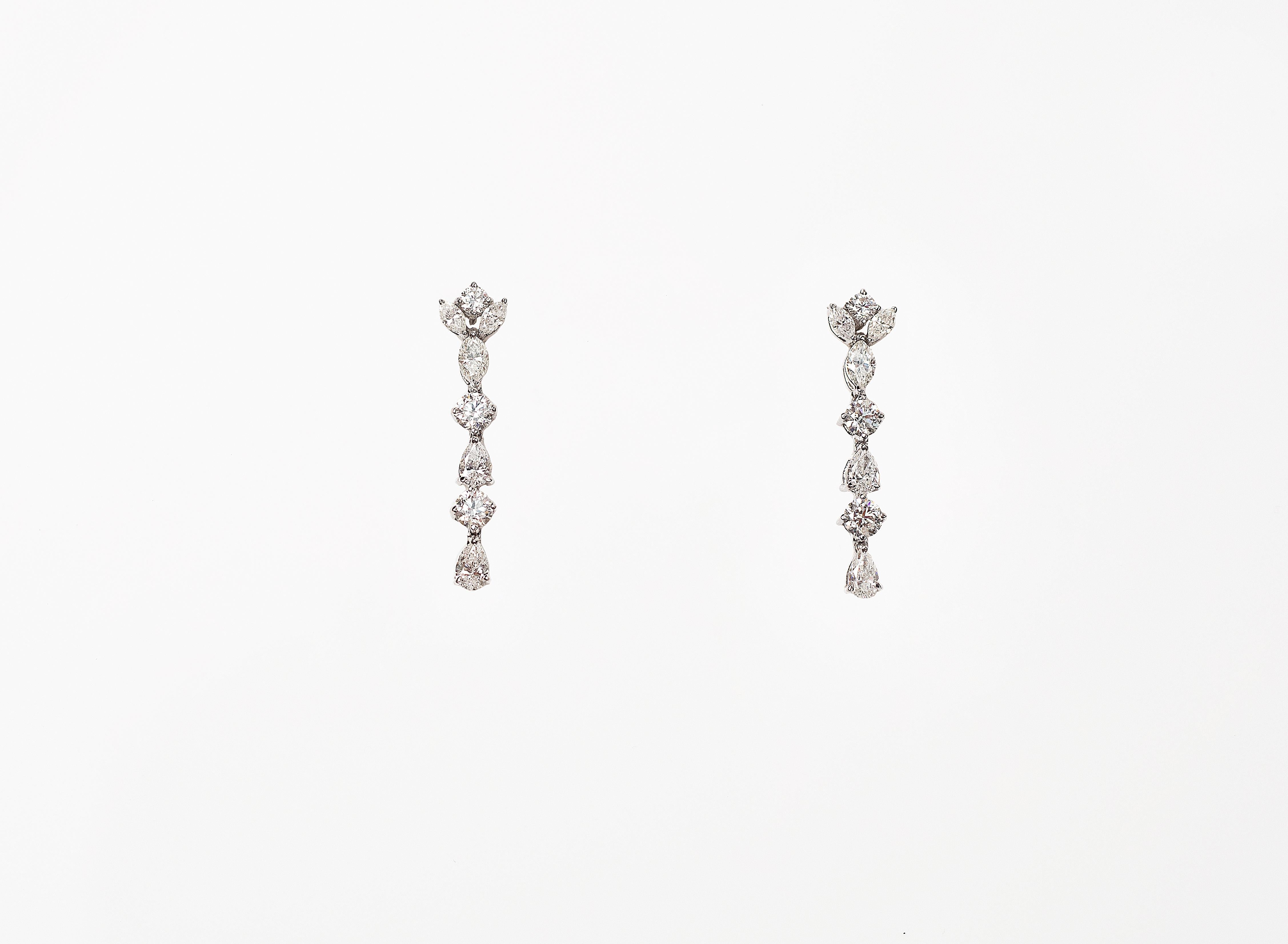 Fancy Shape Diamonds Earrings Handcrafted in 18K Gold
Gold weight - 6.626 gms
Diamond Weight - 4.47 cts
Diamond Clarity - VS-Si
Colour - G
Post and Clip System