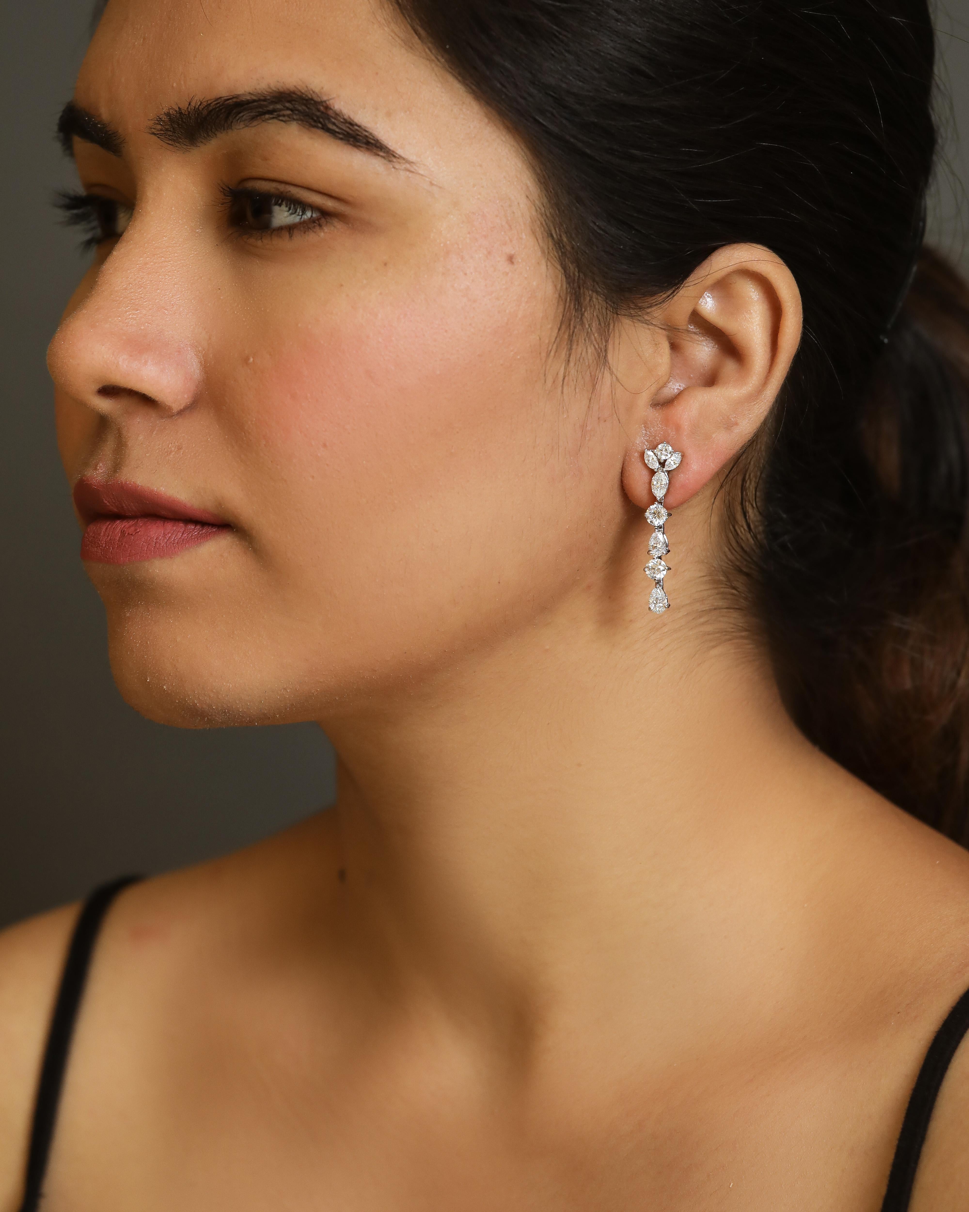Pear Cut 4.47 cts Diamond Earrings in 18K Gold For Sale