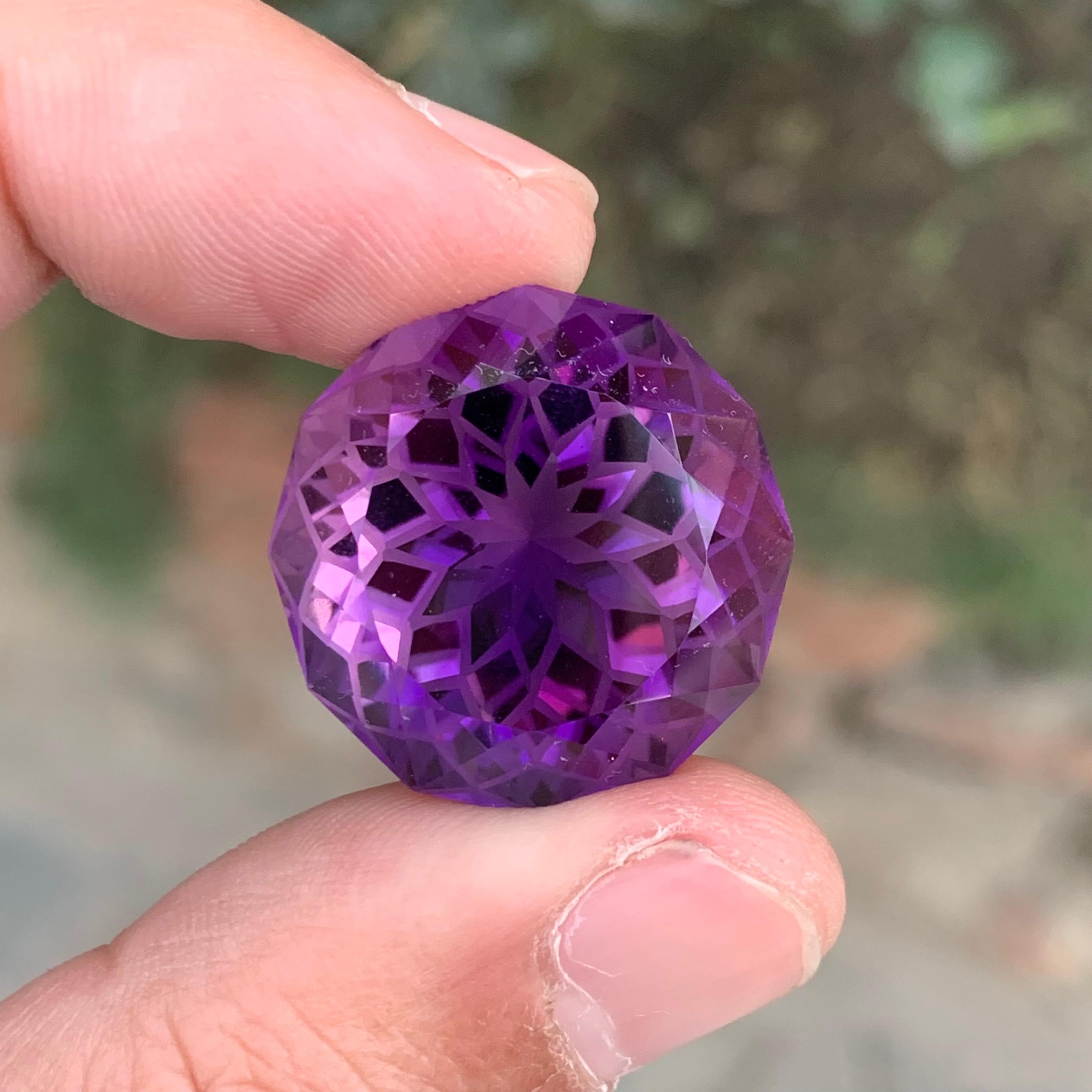 Stone: Amethyst

Weight : 44.75 Carats
Dimension: 22 x 22 x 16 Mm
Origin: Brazil
Shape: Round 
Color: Deep Purple
Treatment: Non
Certificate: On Customer Demand

Amethyst, a stunning violet variety of quartz, is known not only for its beauty but