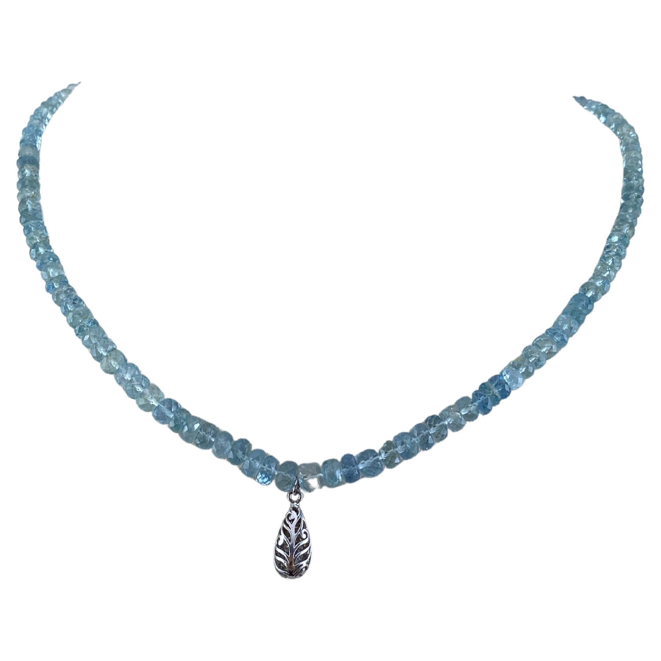 An elegant chain of 44.77 carat Aquamarine beads, with a 18K Gold and Diamond pendant. The chain is 16 inches in length, but can be altered. 
Please feel free to message us for more information. 