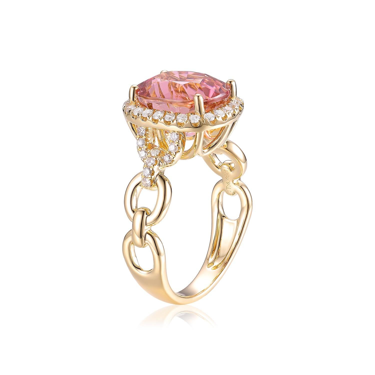 This stunning ring is a true statement piece, featuring a vibrant 5.70-carat tourmaline at its center. The tourmaline's rich green hue is beautifully complemented by a halo of sparkling diamonds, totaling 0.51 carats, which enhance its brilliance