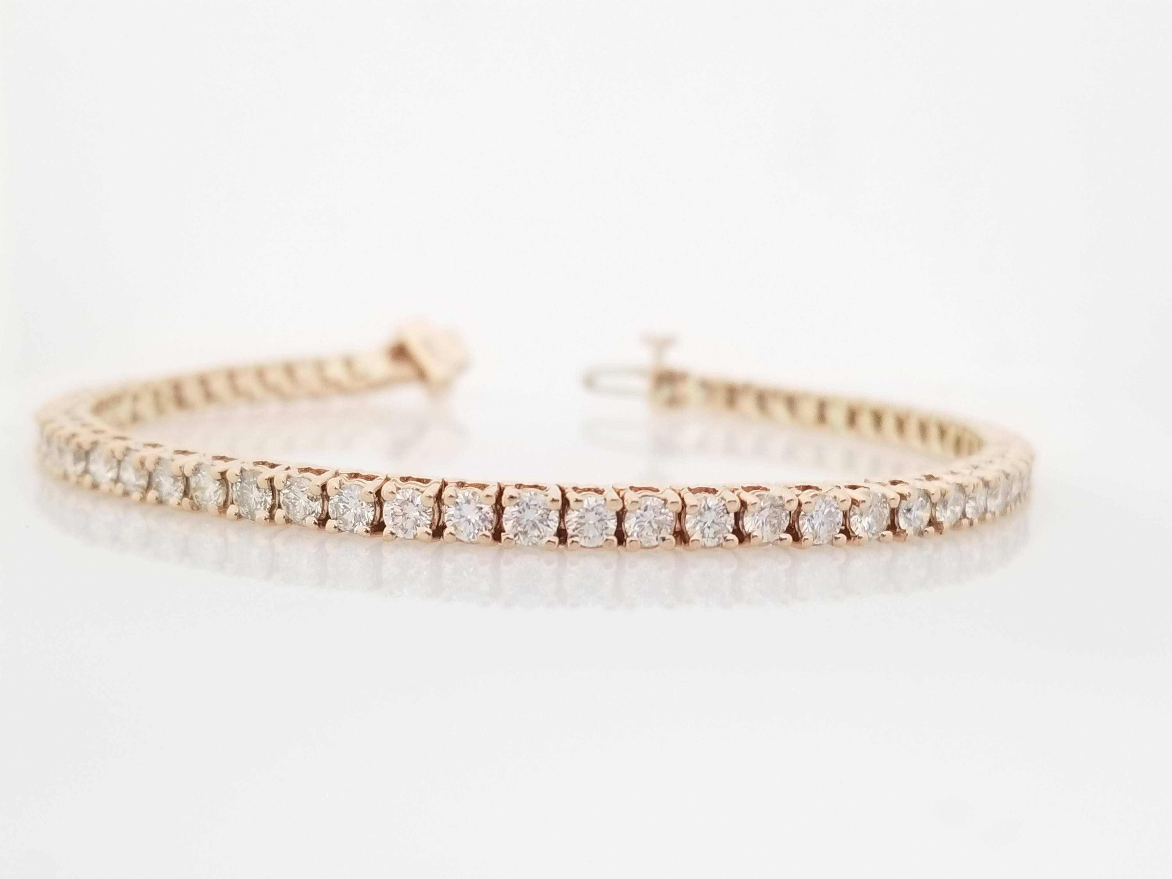 Beautiful natural diamond tennis bracelet, round-brilliant cut white diamonds clean and Excellent shine. 14K rose gold classic four-prong style for maximum light brilliance. Elegance for every moment.

7 inch length. 
3.3 mm wide. 
Average I Color,