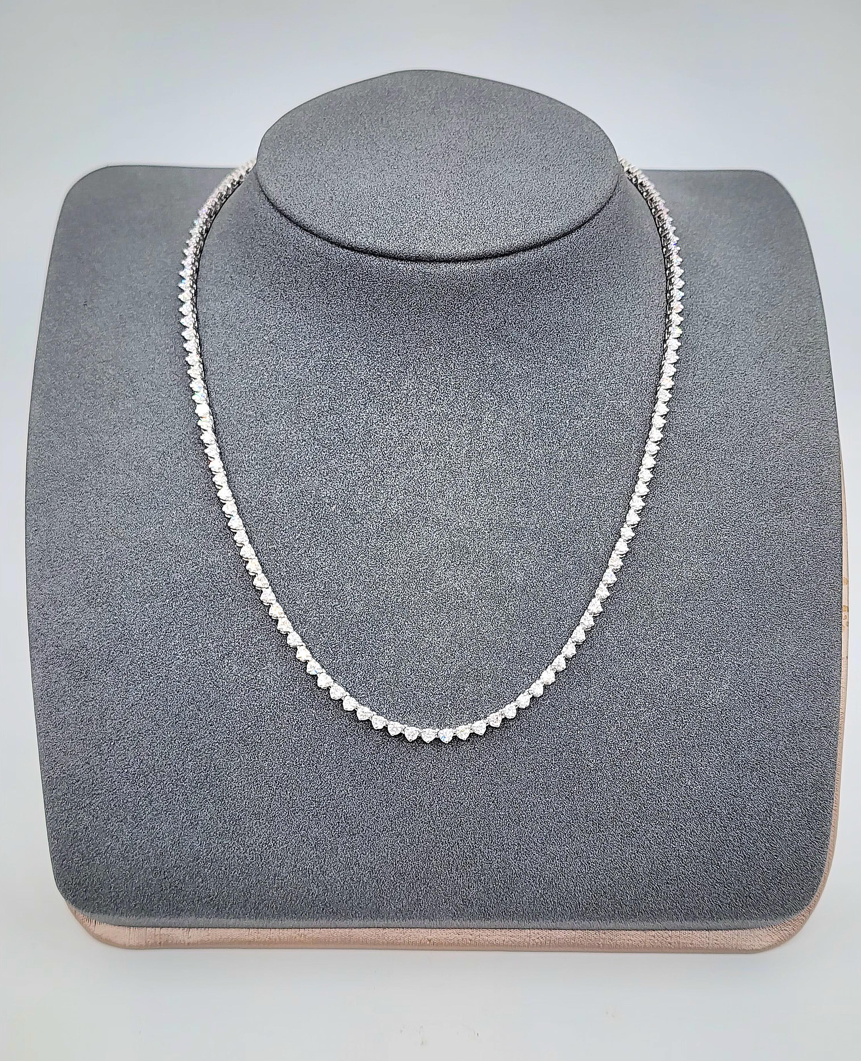 This stunning 4.48 ct diamond tennis has 136 diamonds mounted on 14k white gold. The diamonds boast a color of F/G and VS2/SI1 in clarity. A gorgeous necklace accompany any wardrobe. 