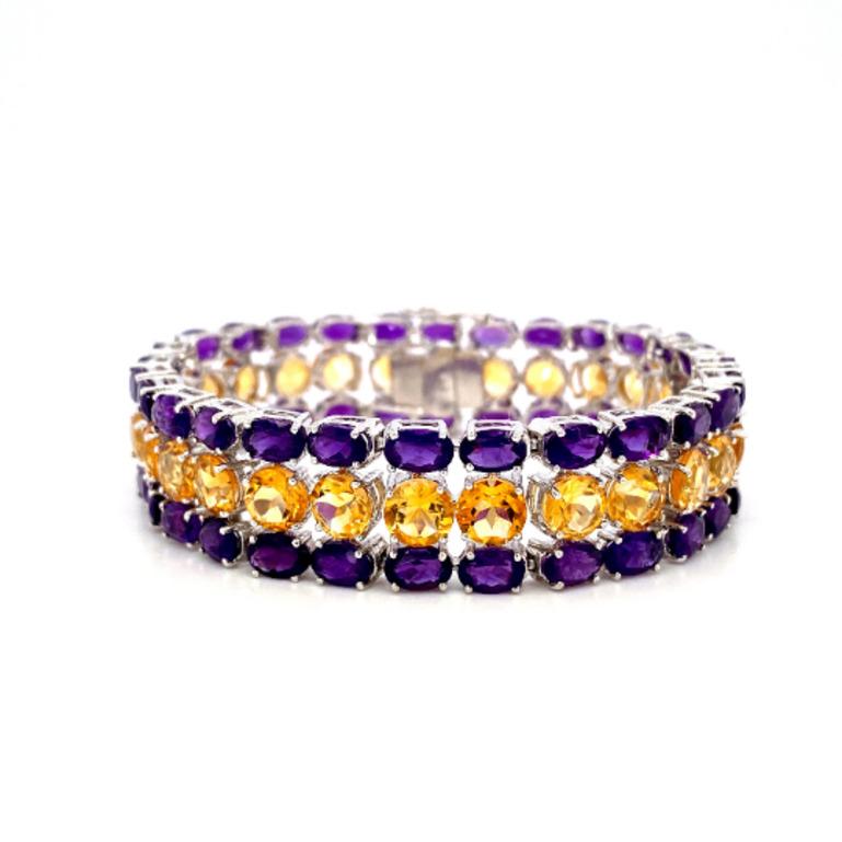 Beautifully handcrafted 44.80 Carat Amethyst and Citrine Gemstone Wide Bracelet, designed with love, including handpicked luxury gemstones for each designer piece. Grab the spotlight with this exquisitely crafted piece. Inlaid with natural amethyst