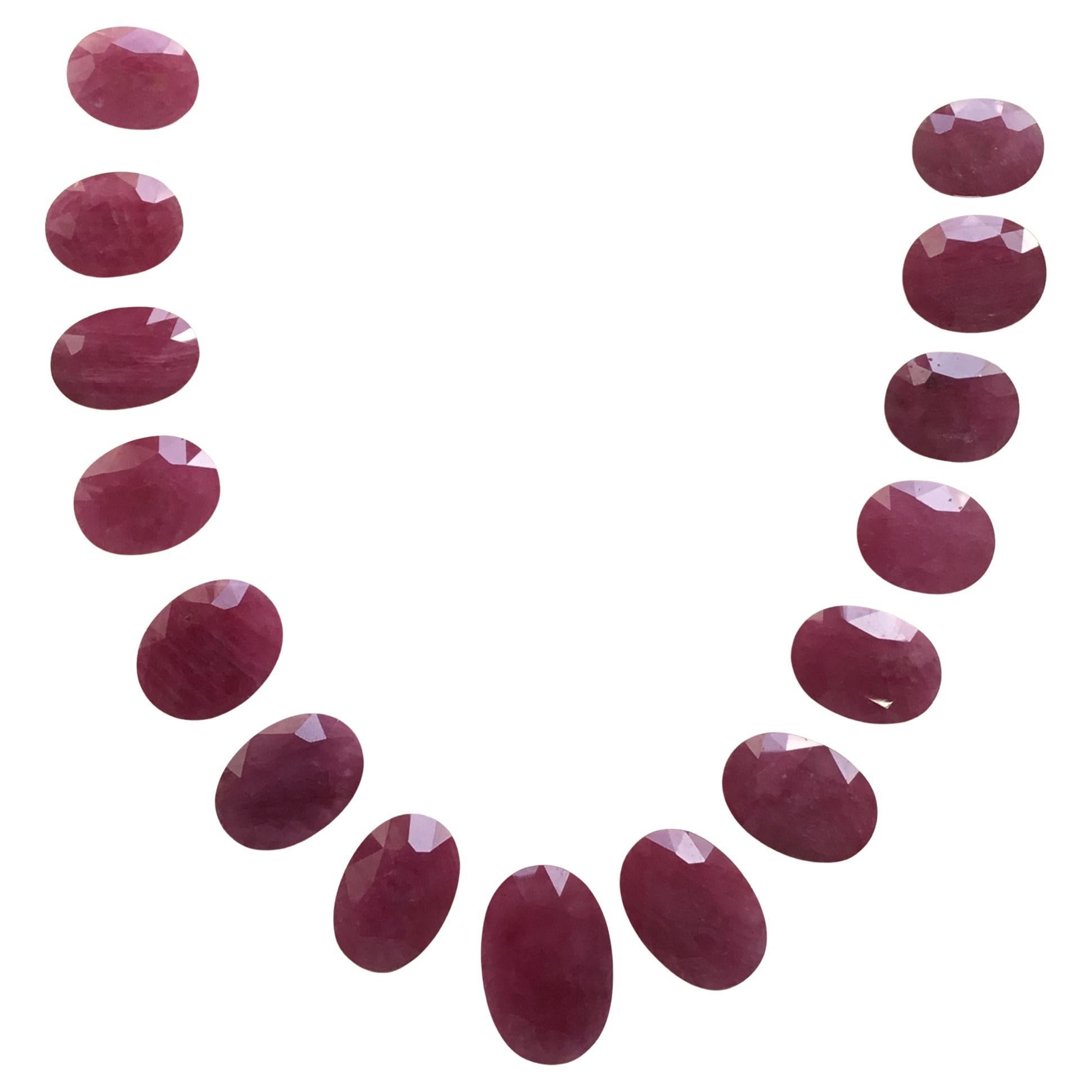 448.41 Carats Ruby Mozambique Oval Faceted Cut stone Layout Heated Natural Gem