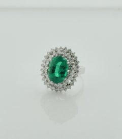 Anello con smeraldo e diamanti da 4,49 carati in 18 carati con certificato GIA