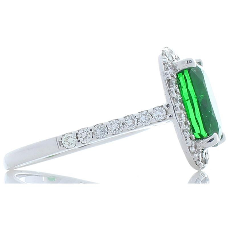 Contemporary 4.49 Carat Oval Tsavorite and Diamond Cocktail Ring in 14 Karat White Gold