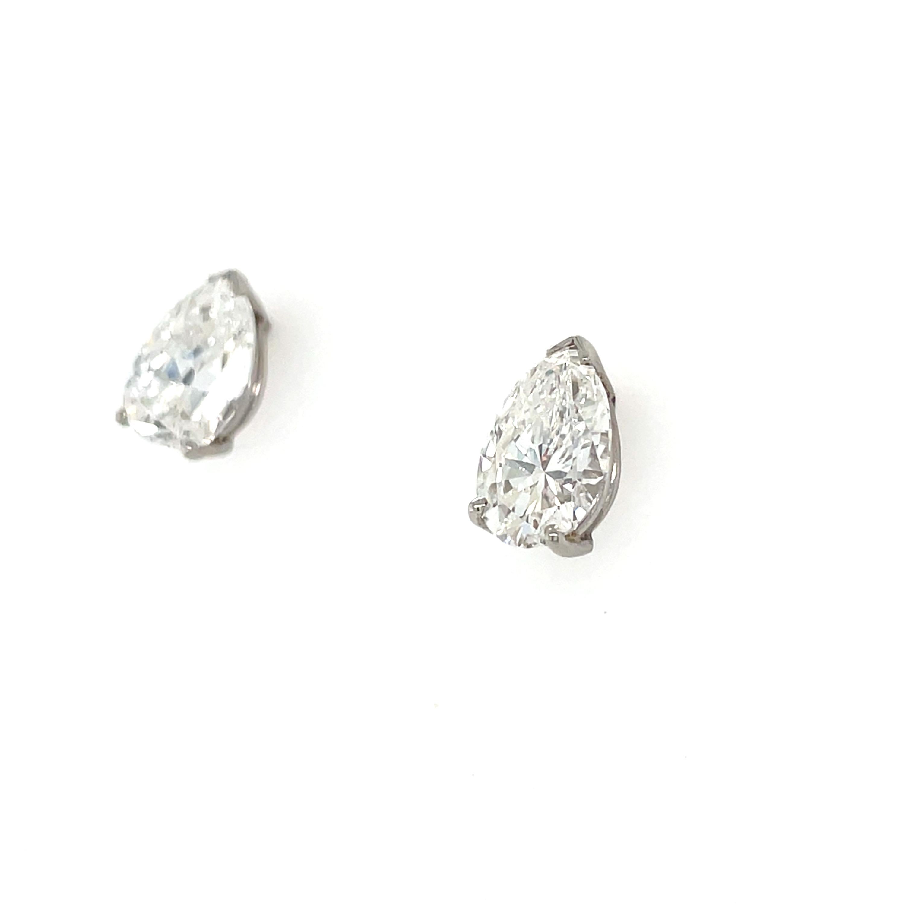 Contemporary 4.49 Carat Pear Shape Diamond Stud Earrings For Sale