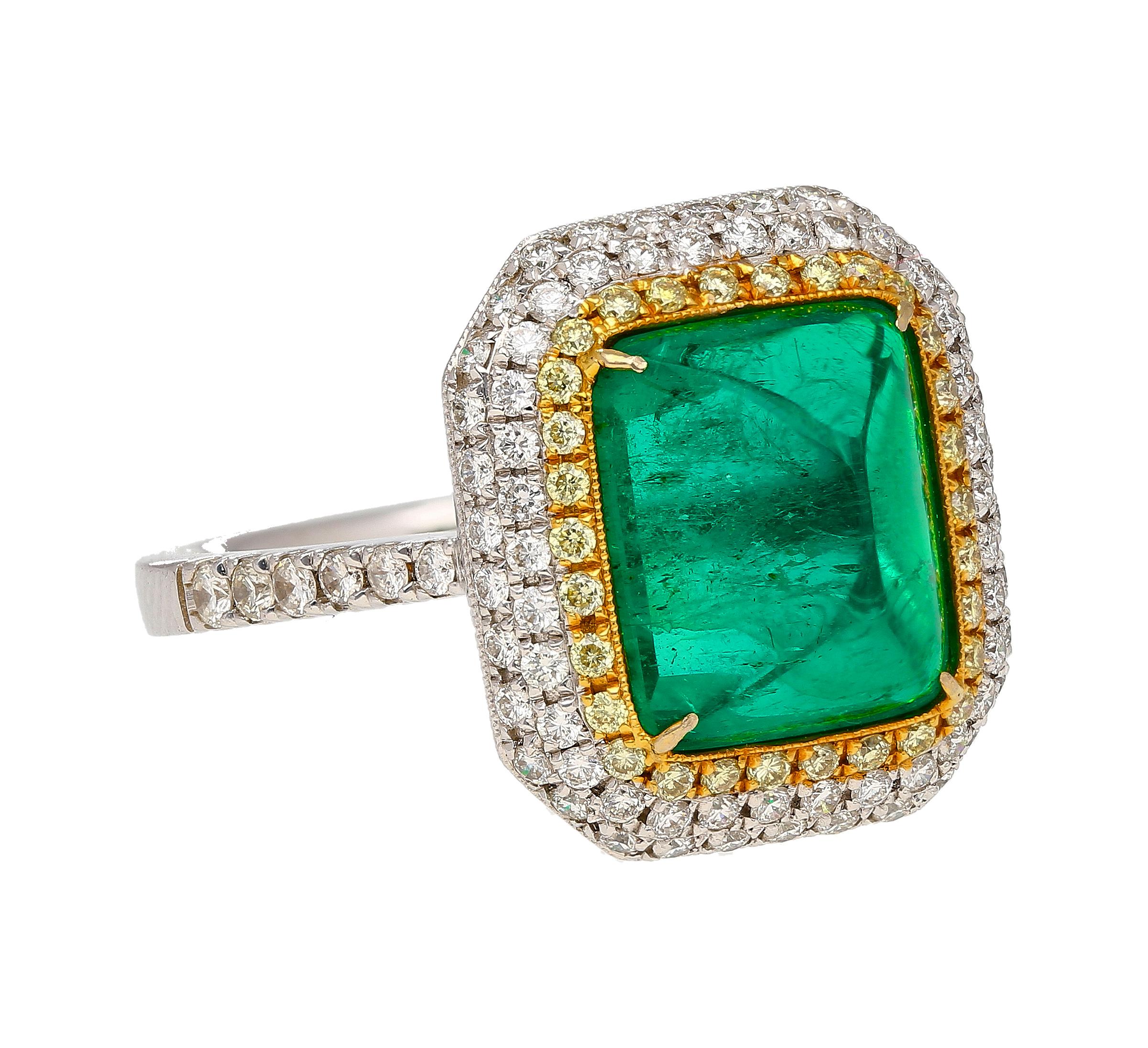 Unveil luxury and sophistication with our remarkable 4.49 carat sugarloaf cabochon cut emerald ring. Crafted with precision and adorned with a striking yellow and white diamond halo. 

Set in lavish 18K solid gold, with a two-tone overlay that