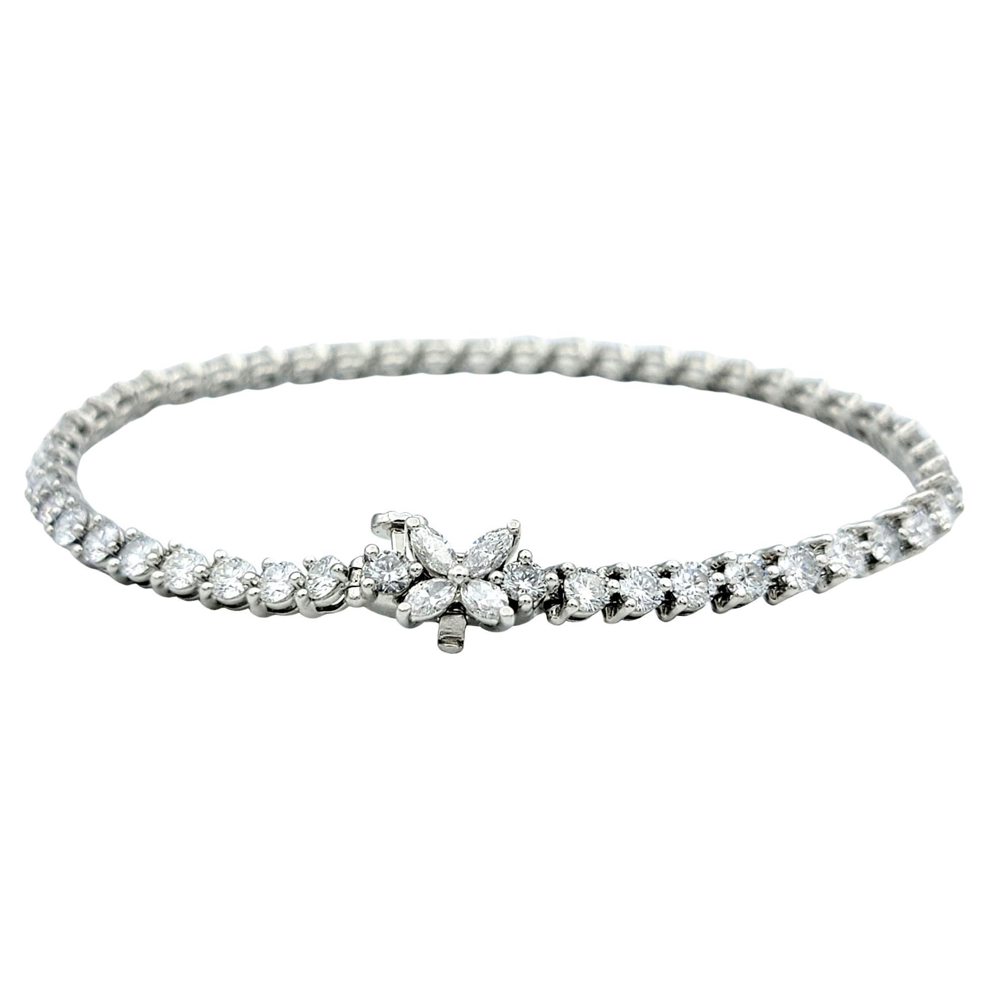 The inner circumference of this bracelet measures 6.63 inches and will comfortably fit a 6.5 inch wrist. 

This beautiful Tiffany & Co. Victoria diamond tennis bracelet is a stunning piece that exudes elegance and sophistication. Crafted with