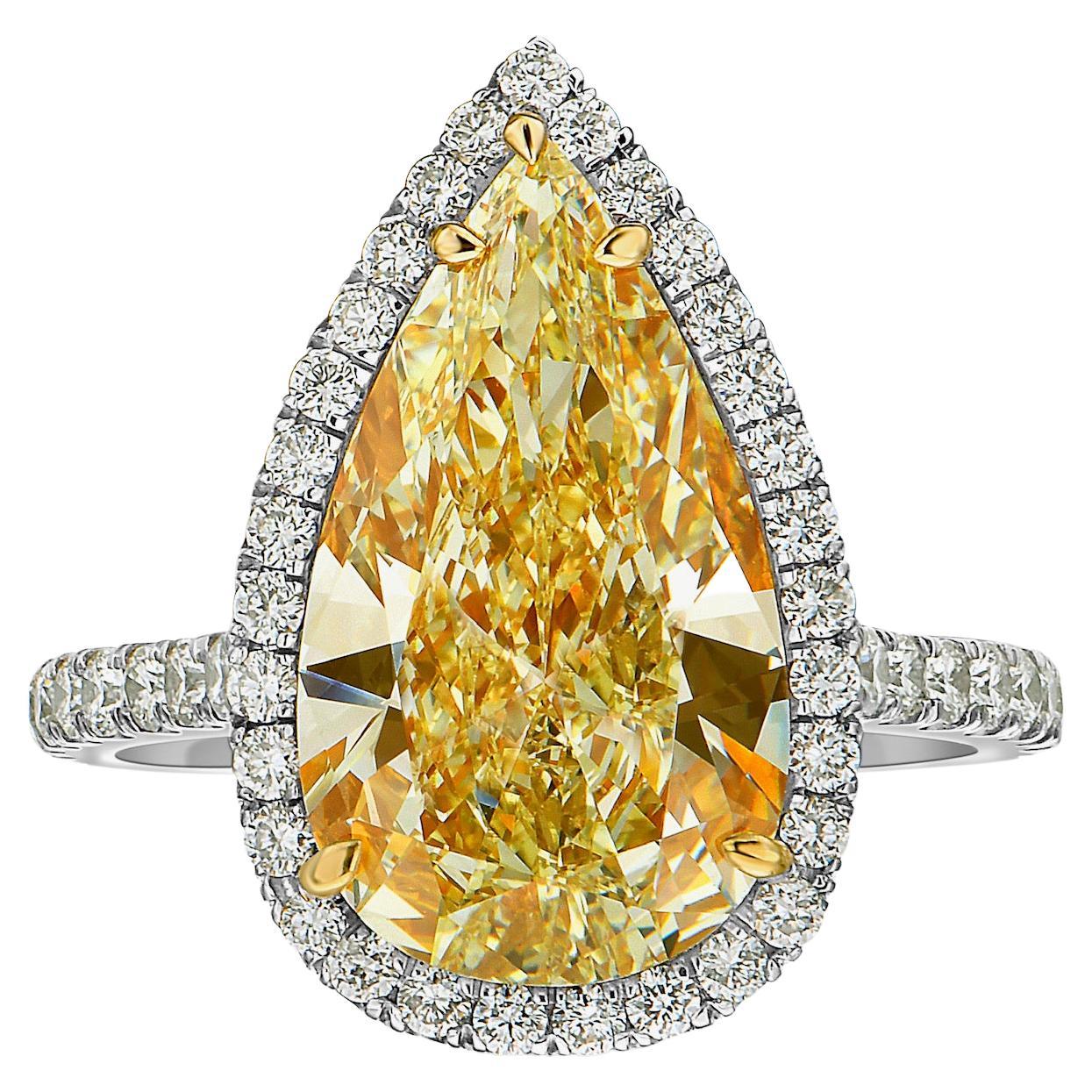 4.49ct GIA Light Yellow VS1 Extra Elongated Pear Shape Diamond Ring