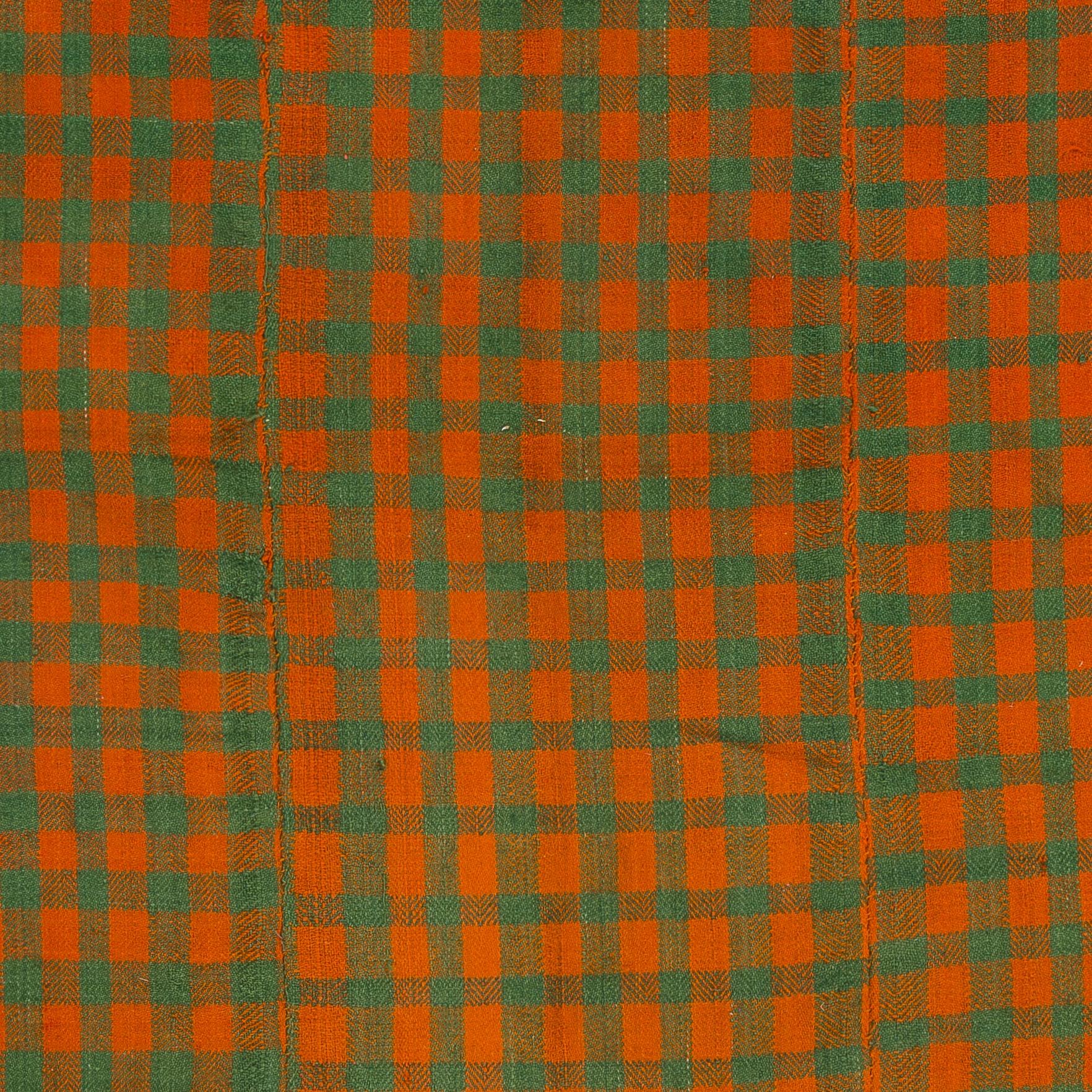 Vintage checkered Turkish flat-weave Kilim rug in orange and citrus green color.
This beautiful and simple weaving is sturdy and clean, it can be used on the floor as a rug or as a bed cover, sofa throw or wall hanging.

Size: 4.4 x 5 Ft Ft (132 x