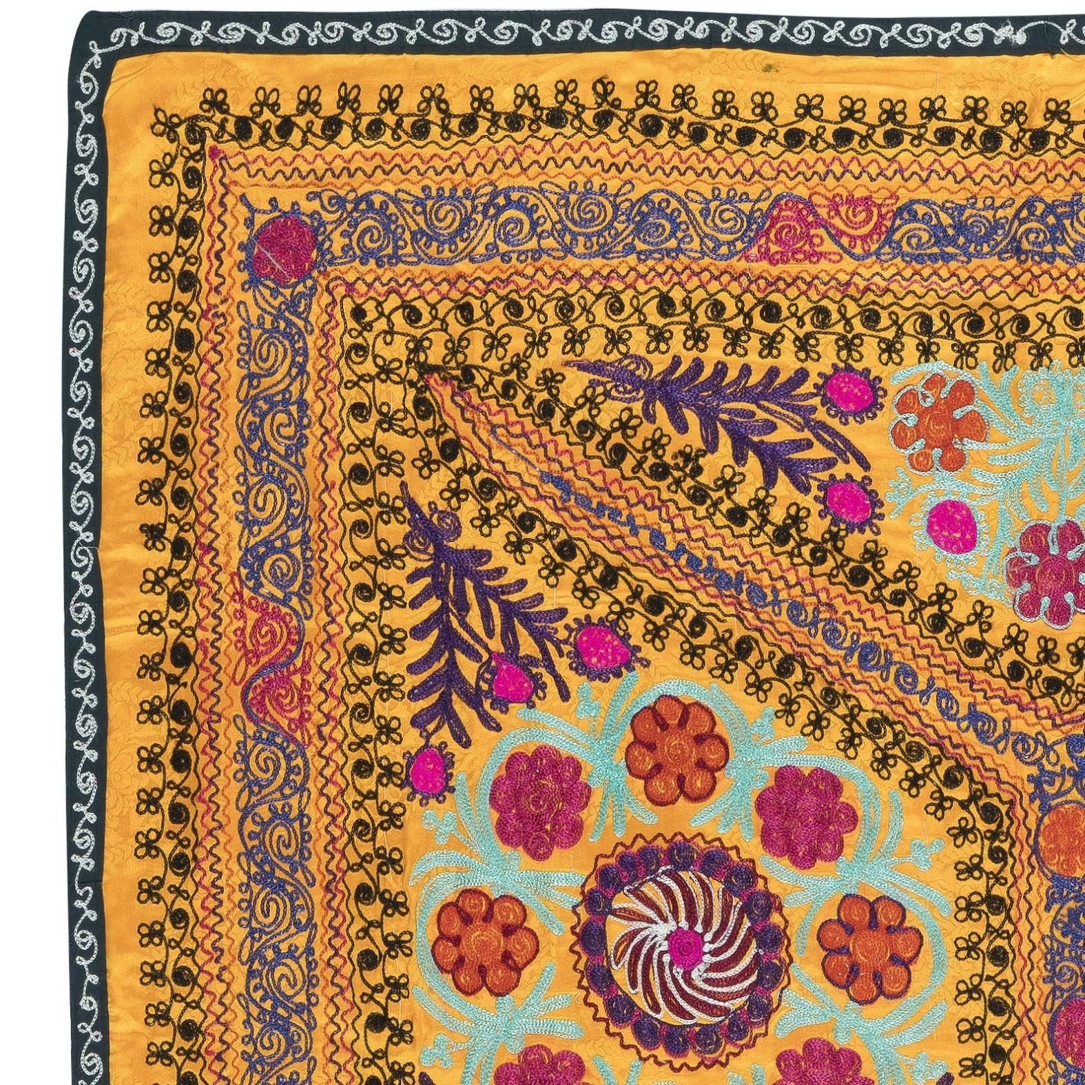 Introducing our exquisite new suzani hand embroidered wall hanging, a captivating piece that combines ancient craftsmanship with modern artistry. This embroidered cloth is not just a suzani throw, but a remarkable suzani wall hanging that will