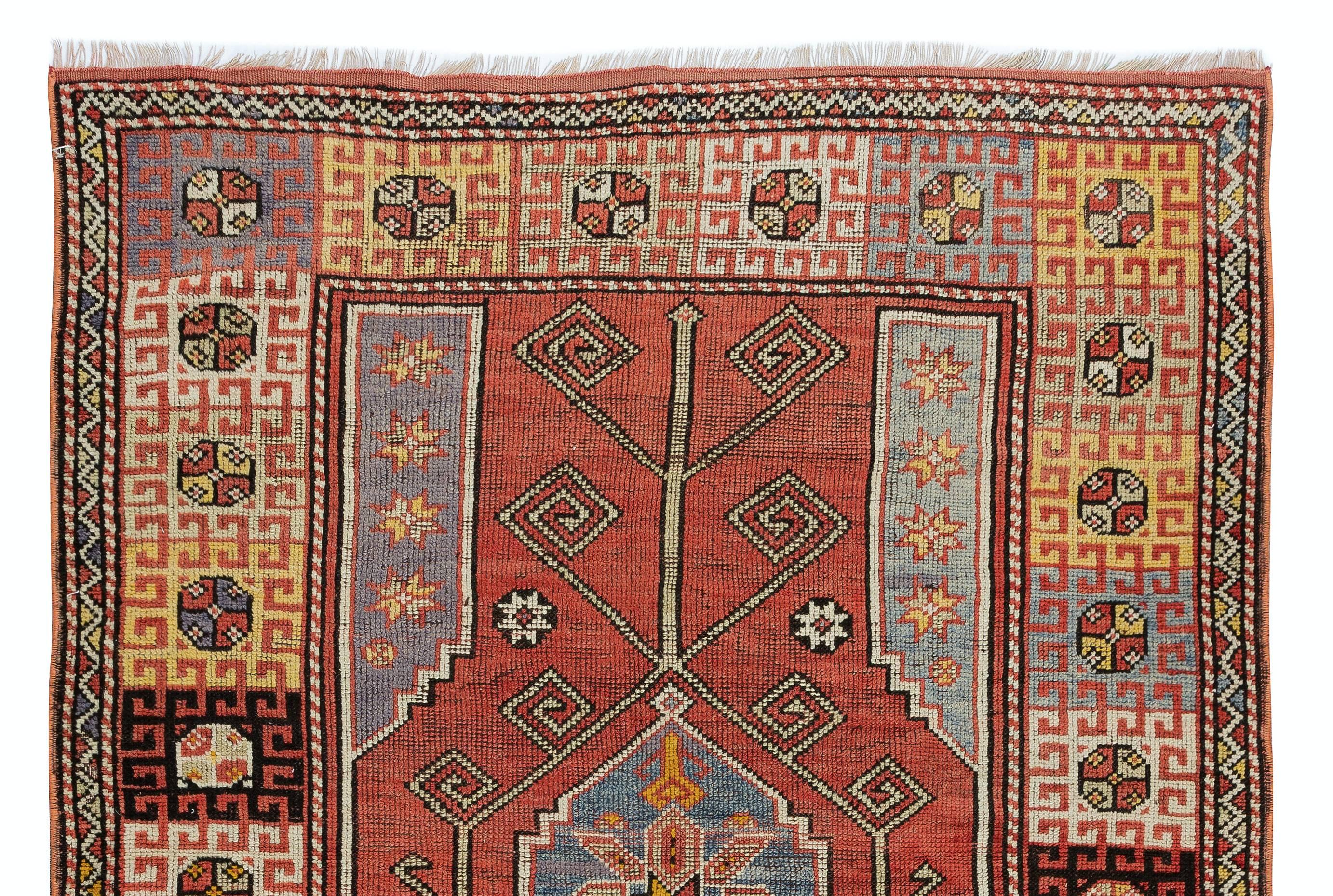 Hand-Knotted 4.4x6 Ft One-of-a-Kind Vintage Handmade Turkish Rug in Red, Blue, Orange, Purple