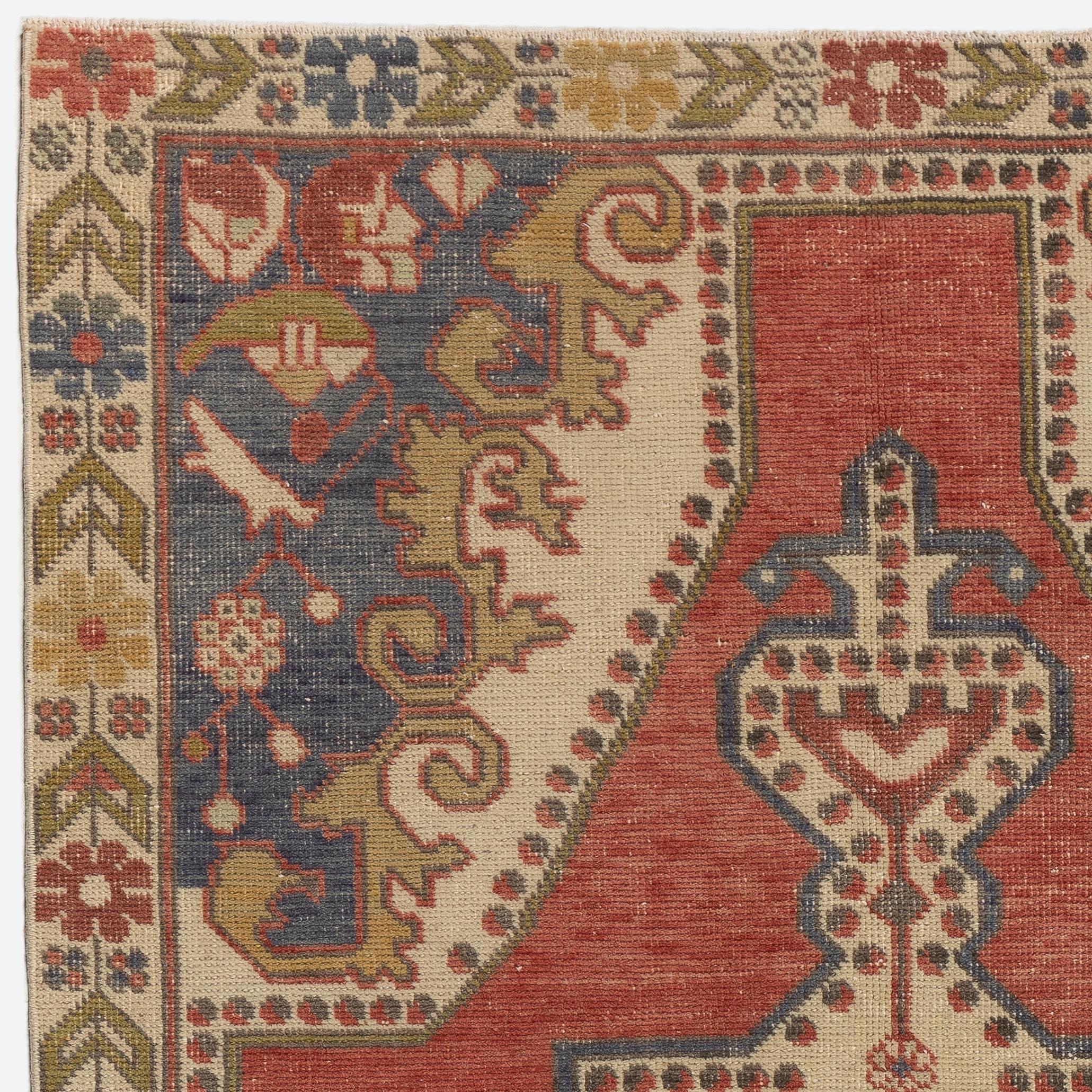 A vintage Turkish village rug with geometric medallion design. Size: 4.4x7.8 Ft.
The rug is hand-knotted with natural sheep's wool, has soft medium pile, in good condition and sturdy. Its soft and warm color palette has a vibrancy to it that could