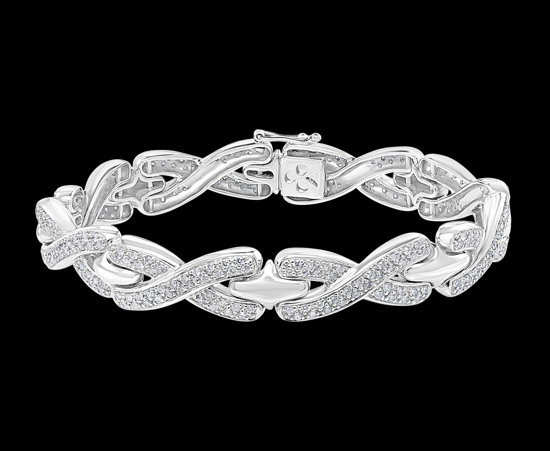 A statement of true, classic elegance, this 18 karat White Gold  Bracelet with Pave Diamond  from signature collection. The interlocking  links of diamonds   provide flexibility with a fabric-like movement. This makes for a very comfortable,