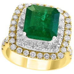 Antique 4.5 Carat Emerald Cut Colombian Emerald and Diamond Two-Tone 18 Karat Gold Ring