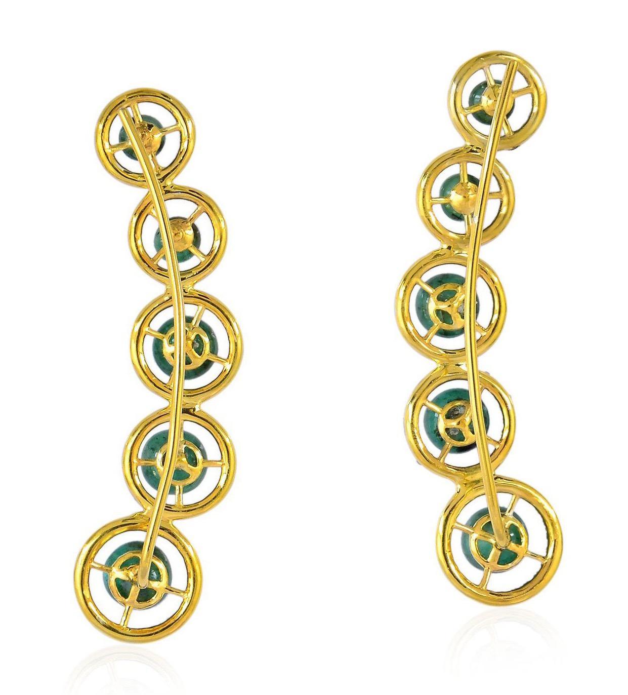 These stunning 4.5 carats emerald ear climbers are handmade in 18-karat gold and sterling silver. It's further enhanced with 1.22 carats of glimmering diamonds.

FOLLOW  MEGHNA JEWELS storefront to view the latest collection & exclusive pieces. 