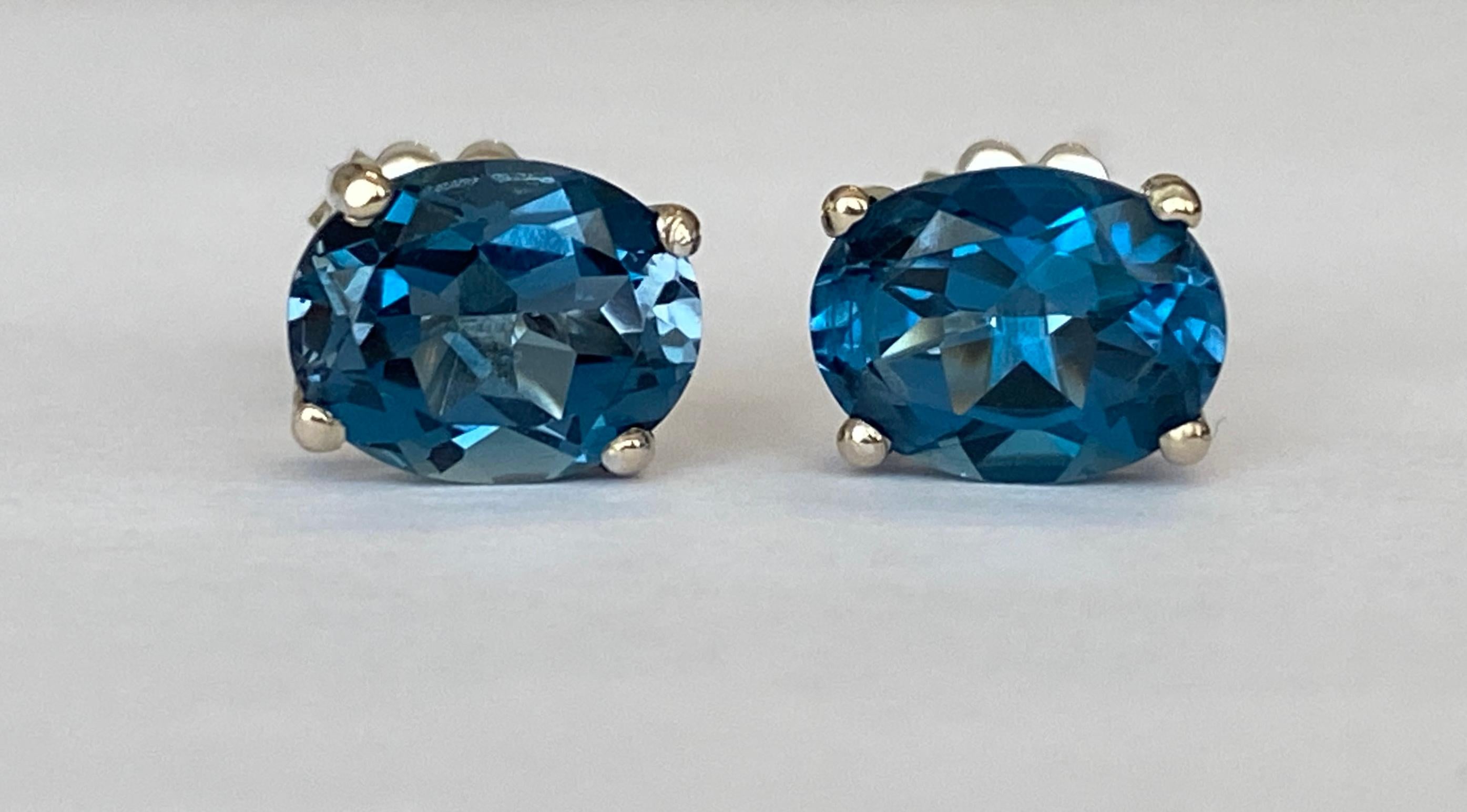 Contemporary 4.5 Carat London Blue Topaz Gold Earrings For Sale