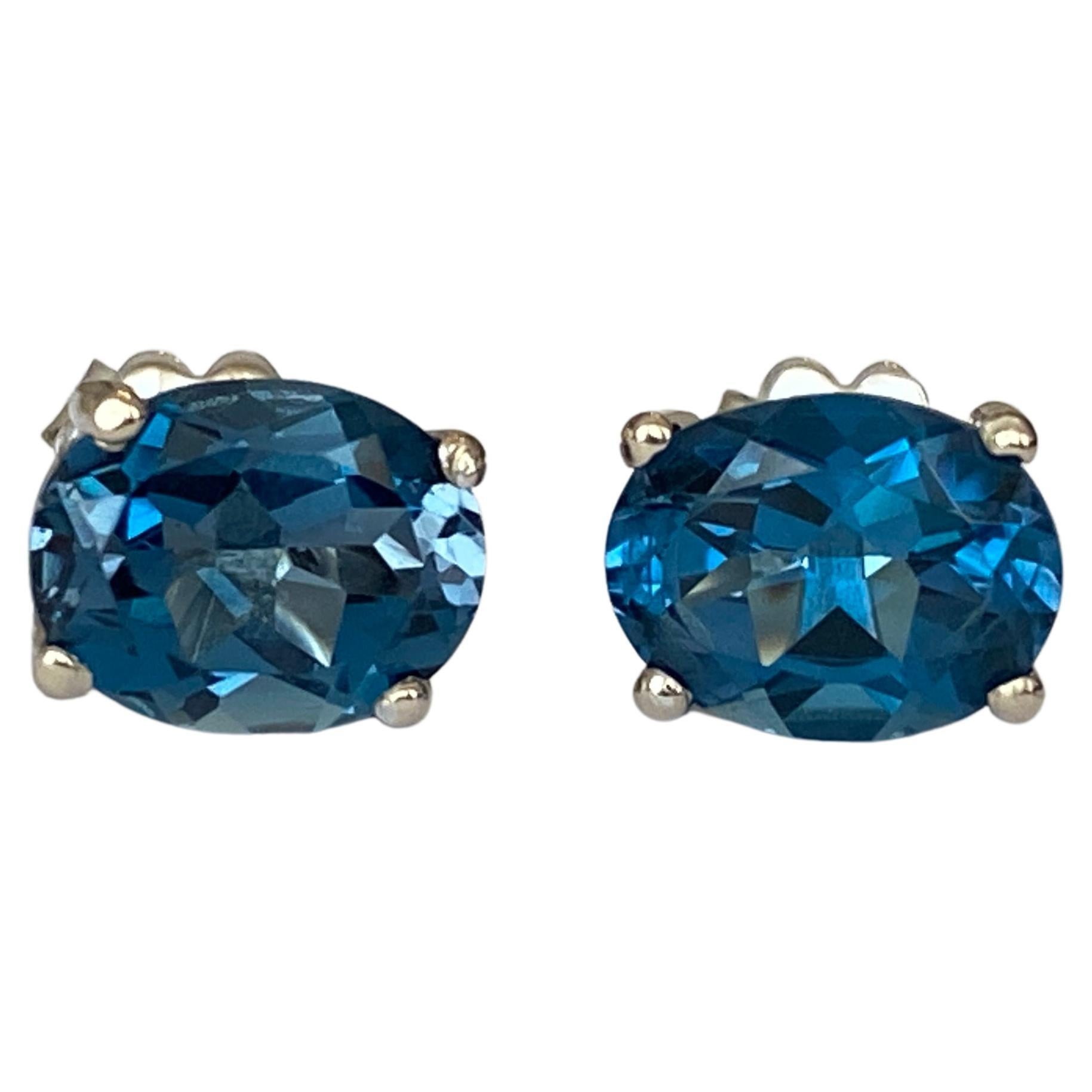 4.5 Carat London Blue Topaz Gold Earrings For Sale