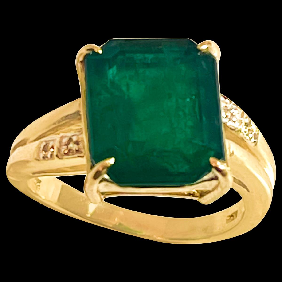 A classic, Cocktail ring 
10X12 Emerald  cut Emerald  Ring 14 Karat Yellow Gold Size 6.8
Emerald cut emerald is the most popular and in demand  Emerald 
Large size Emerald cut Emerald Intense green color with lots of shine and brilliance but has