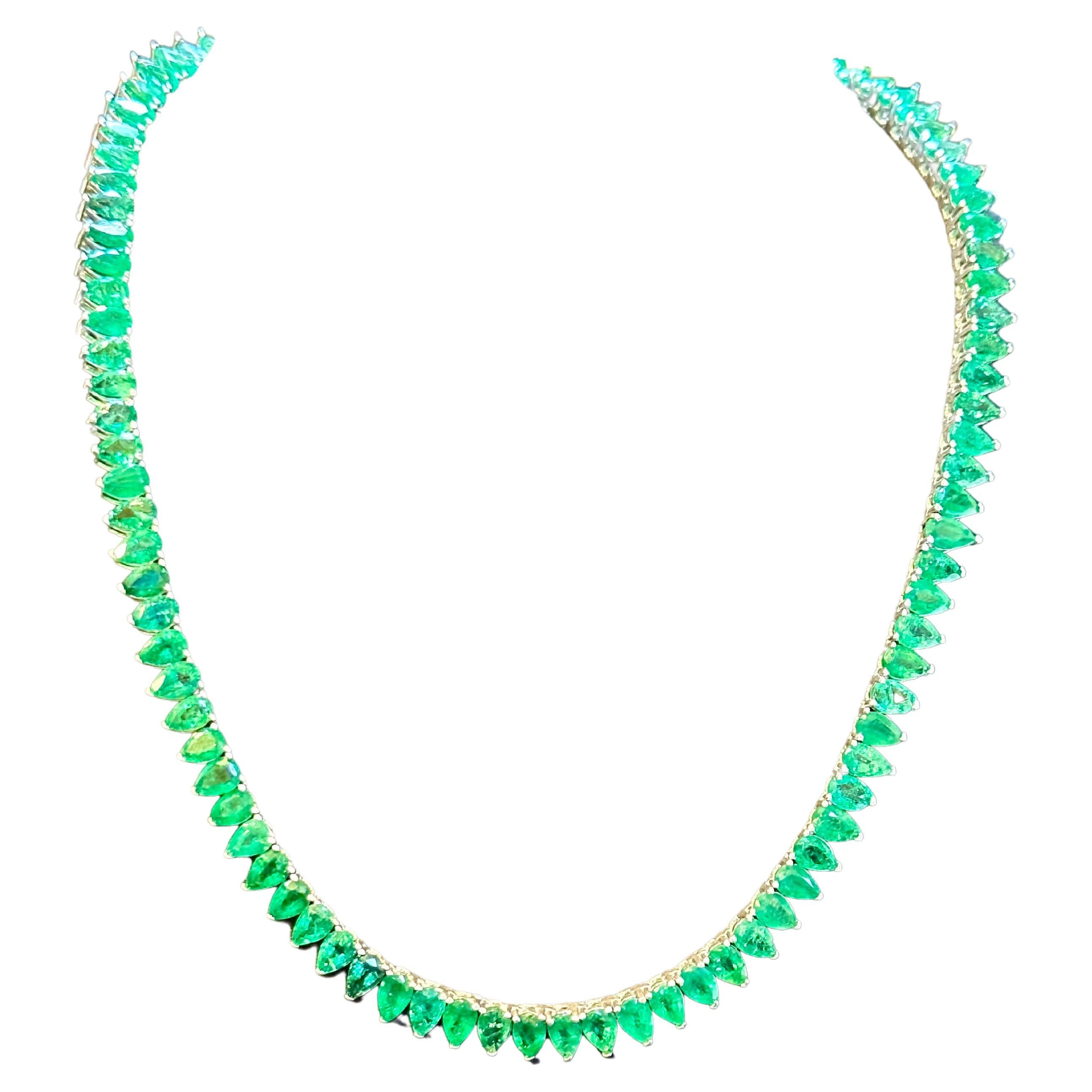 Approximately 45 Ct Oval Brazilian Emerald Tennis Necklace 14KWG 16