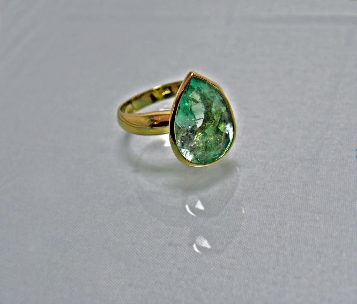 natural emerald solitaire ring