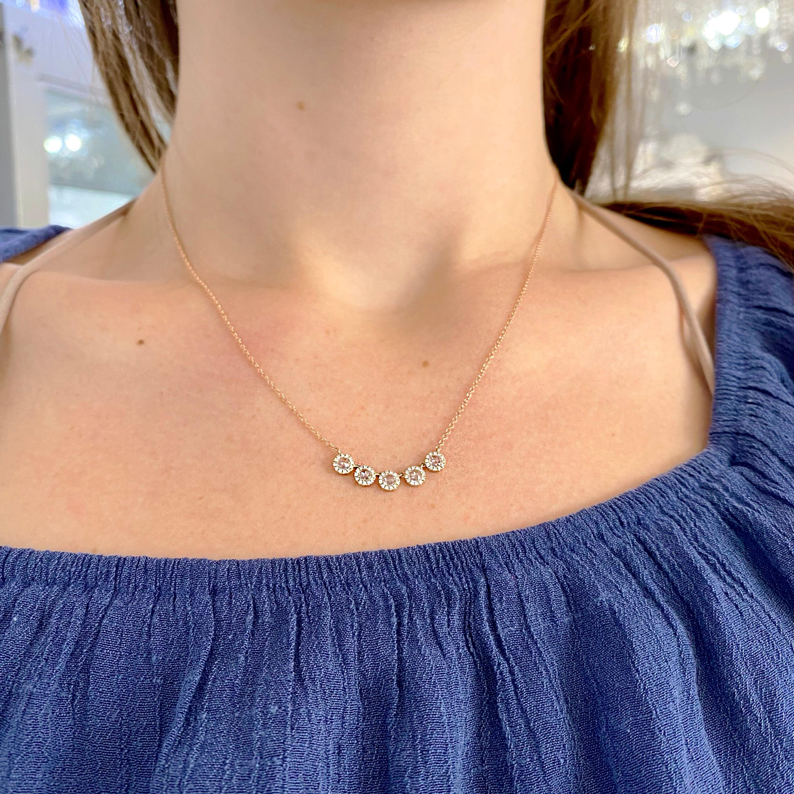 This gorgeous rose gold necklace can perfectly adjust to anyone's neck size. Rose gold is the hottest metal for 2021!

Metal Quality: 14 kt Rose Gold
Diamond Number: 65
Diamond Total Weight: .45 Ct
Diamond Clarity: VS2 (excellent, eye clean)
Diamond