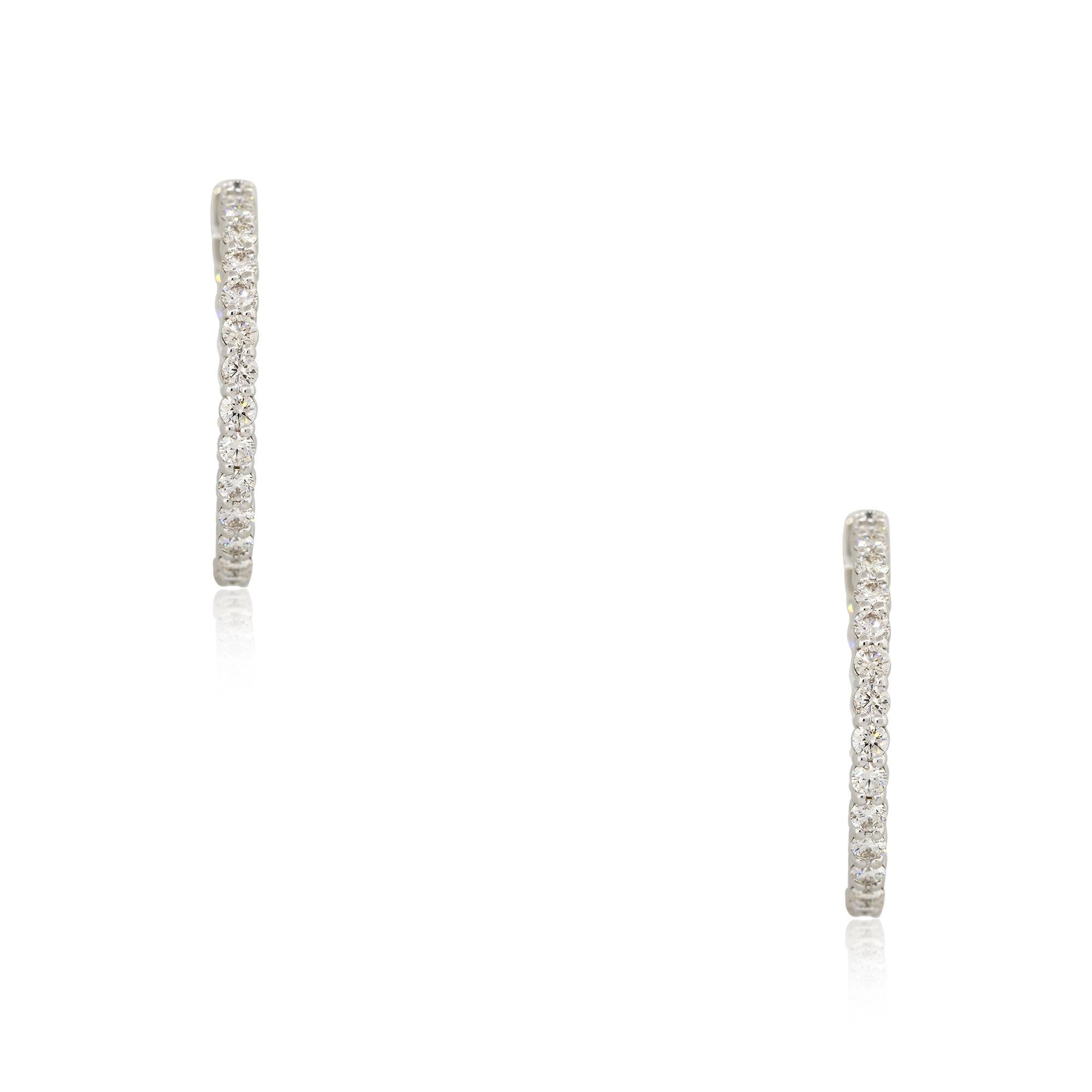 14k White Gold 4.5ct Round Brilliant Cut Diamond Inside Out Hoop Earrings

Product: Inside-Out Diamond Hoop Earrings
Material: 14k White Gold
Diamond Details: There are approximately 4.5 carats of round brilliant cut diamonds (50 stones)
Diamond