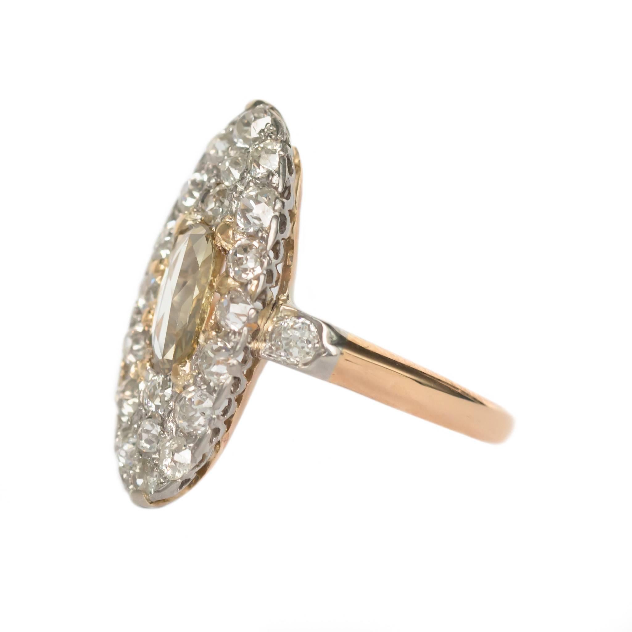 Item Details: 
Ring Size: 7
Metal Type: 14 Karat Yellow Gold
Weight: 5.3 grams

Center Diamond Details:
Shape: Rose Cut
Carat Weight: .45 carat
Color: Fancy Yellow
Clarity: VS1

Side Stone Details: 
Shape: Old Mine Cut
Total Carat Weight: 1.00