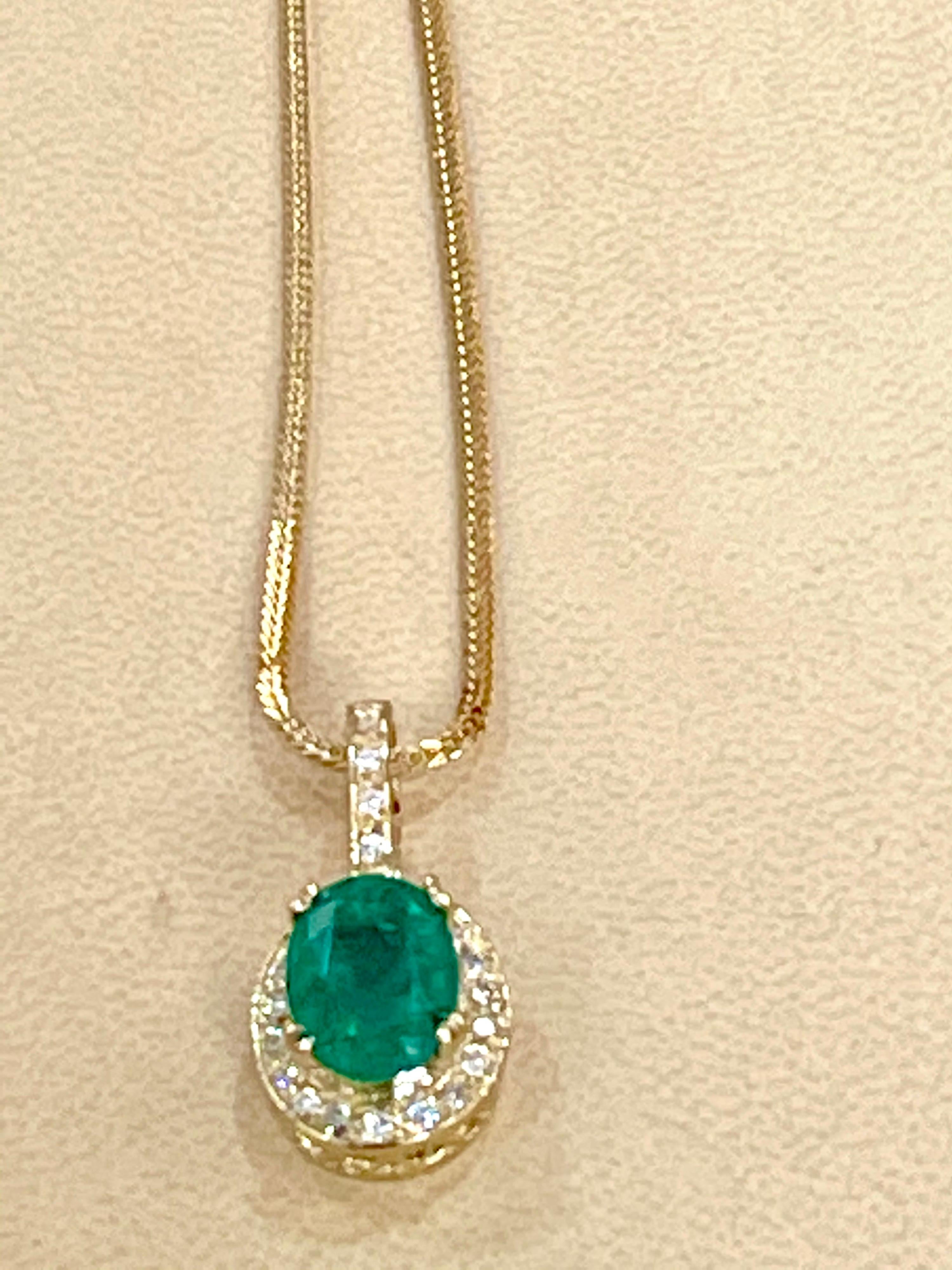 4.0 Ct Natural Oval Shape Emerald & Diamond Pendant 14 Karat Yellow Gold Chain For Sale 6