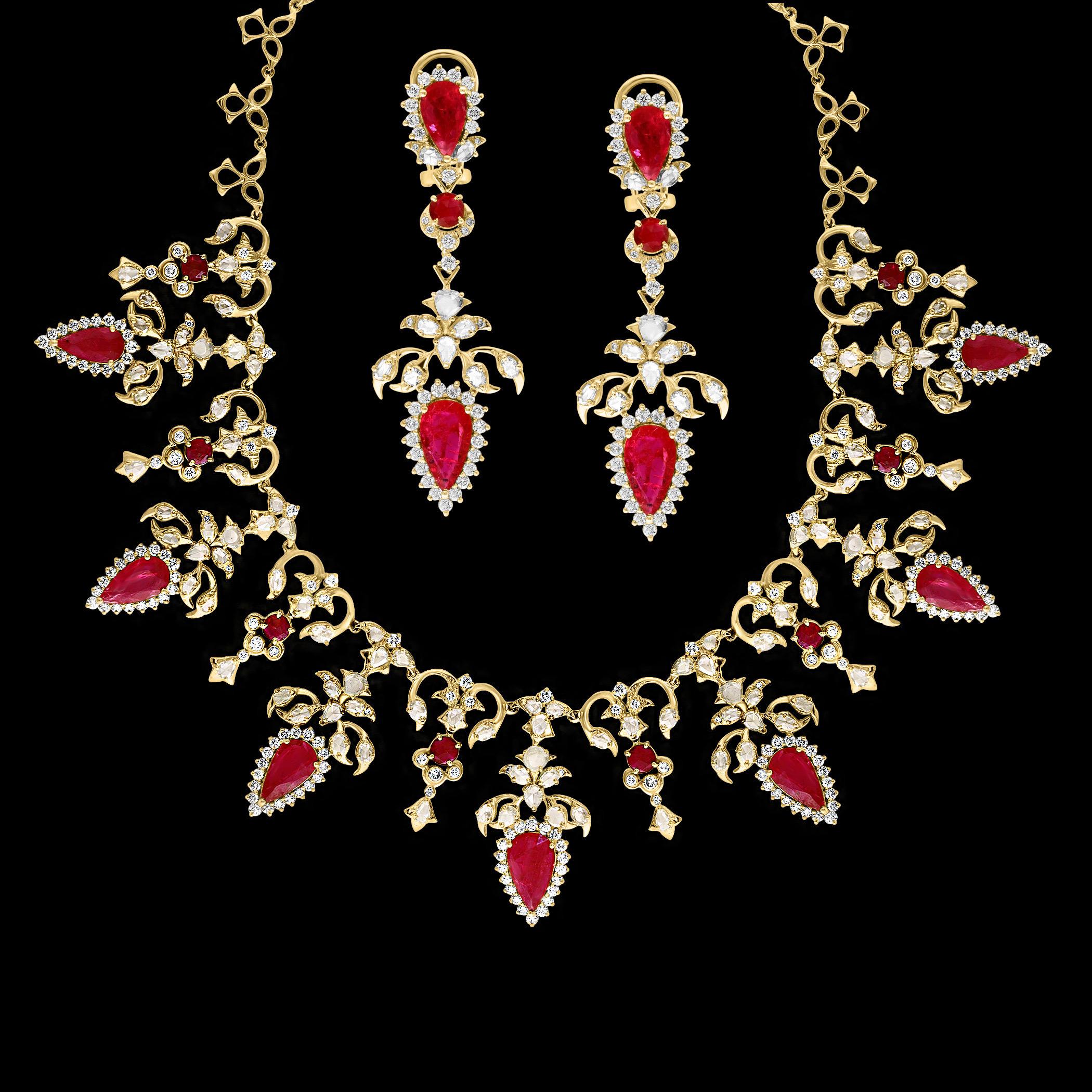 This bridal suite is crafted from 18 Karat gold and features a necklace adorned with 7 large Pear-shaped natural Rubies, totaling 45 carats, along with 22 carats of Rose-cut Diamonds and round brilliant-cut Diamonds. The diamonds boast a Clarity of