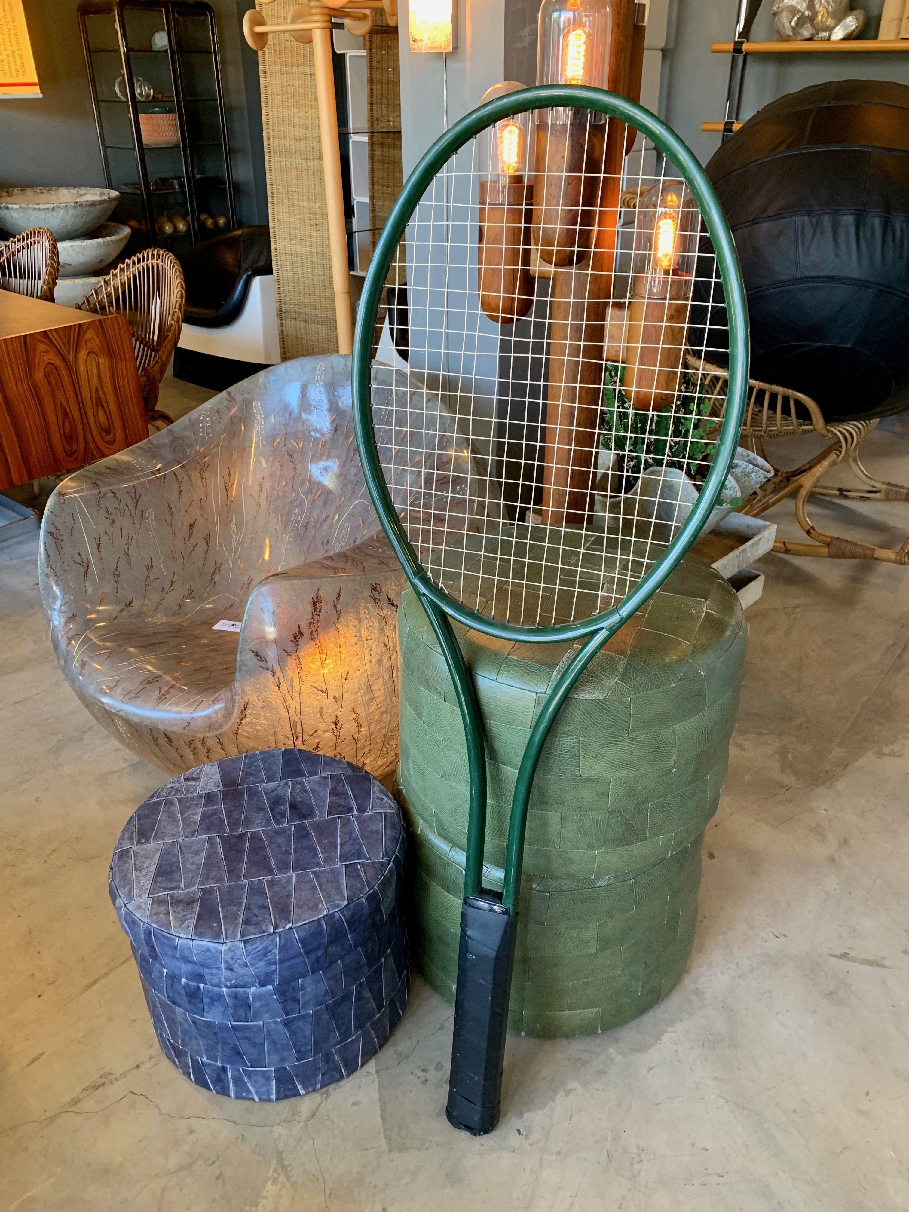 Fun piece of pop art. Giant metal tennis racket store display. Just over 4.5 feet tall. Good vintage condition. Some wear at bottom of handle. Great sculptural display piece.