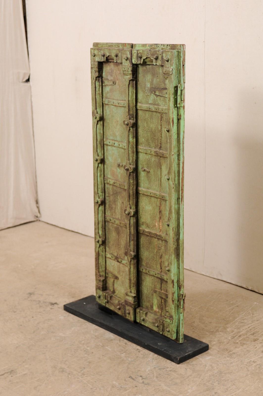 Metal Turn of the Century Doors from India on Custom Stand