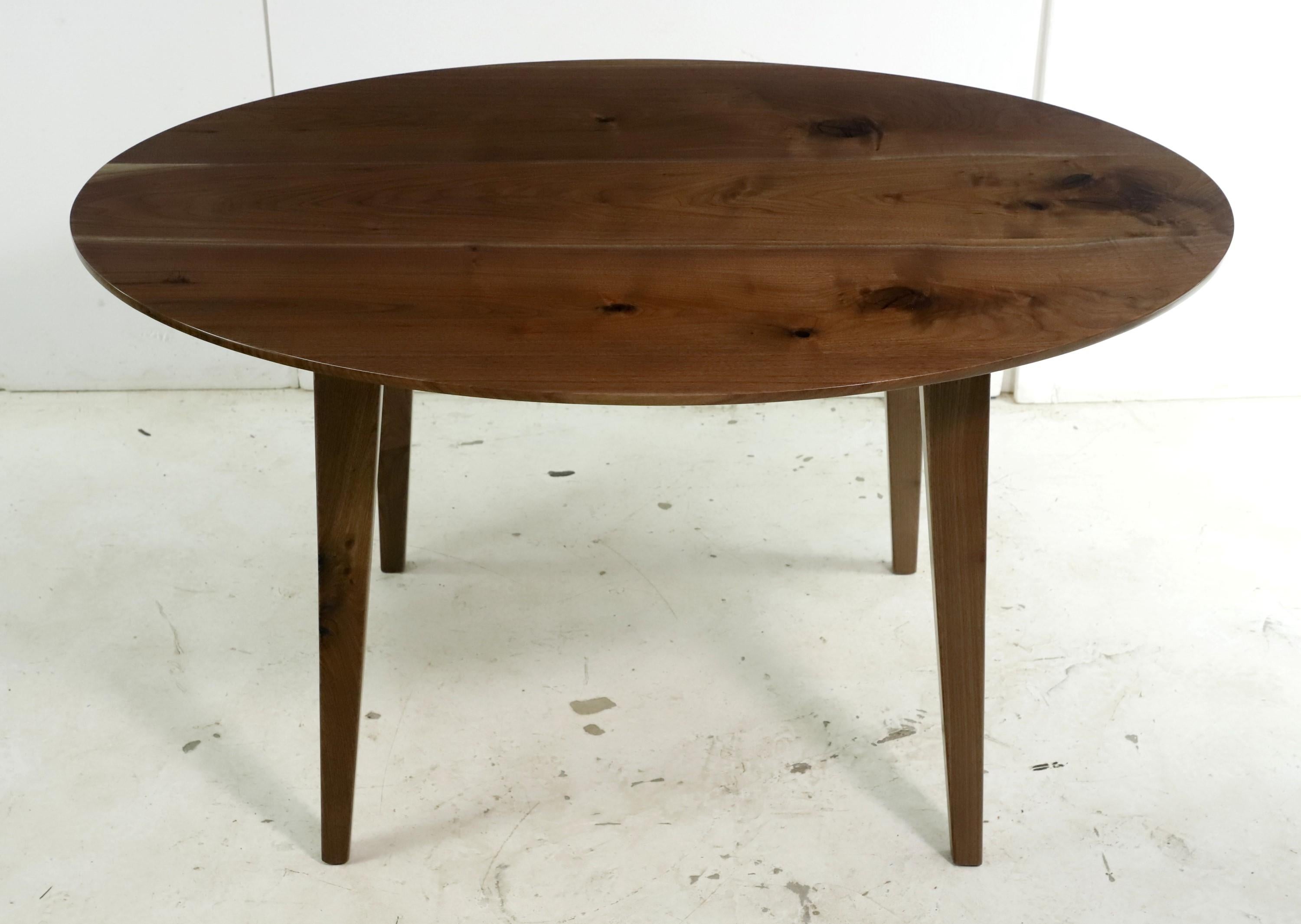 American 4.5 ft Long Oval Solid Walnut Tapered Leg  Dining Table For Sale
