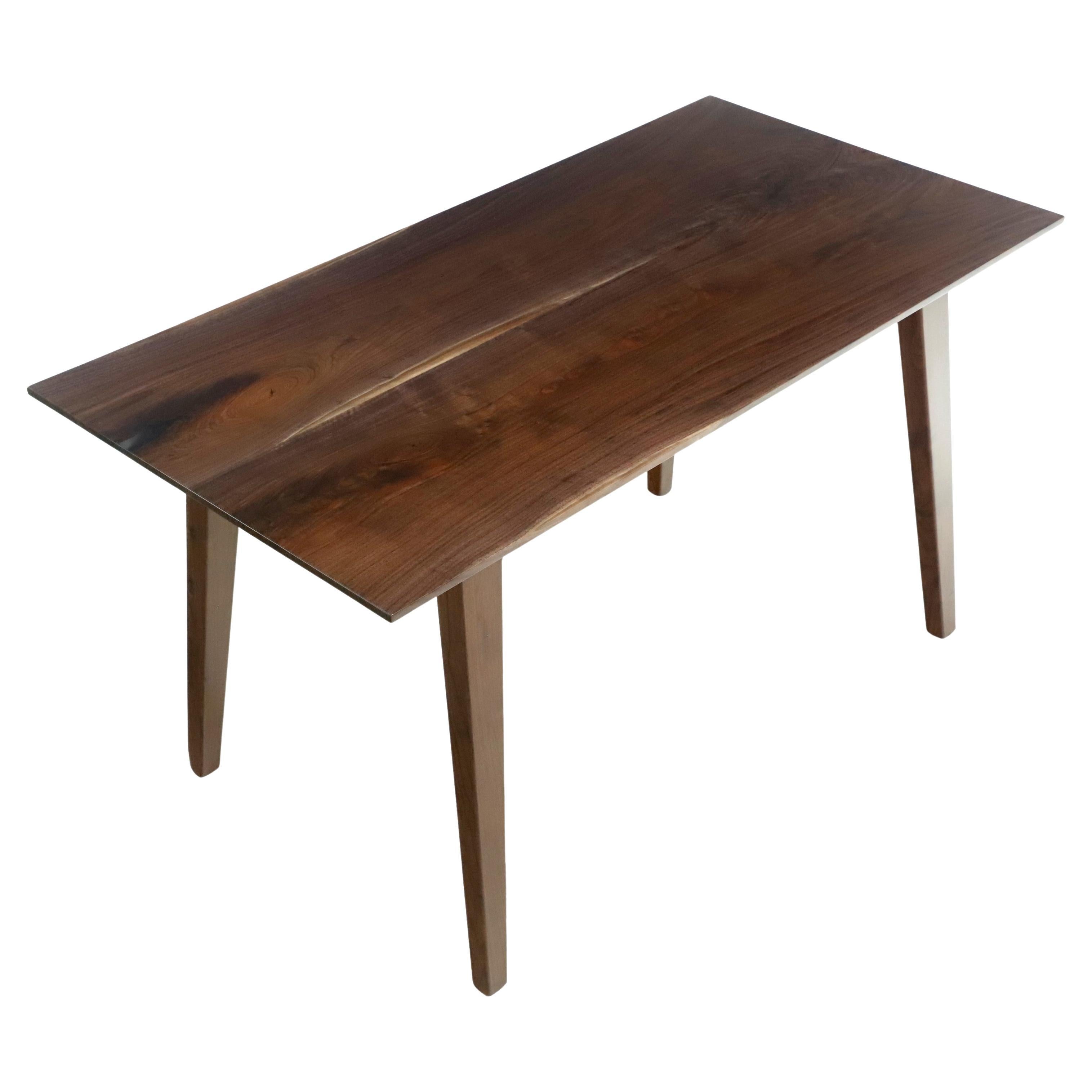 4.5 ft Solid Walnut Resin Detailed Tapered Leg Dining Table