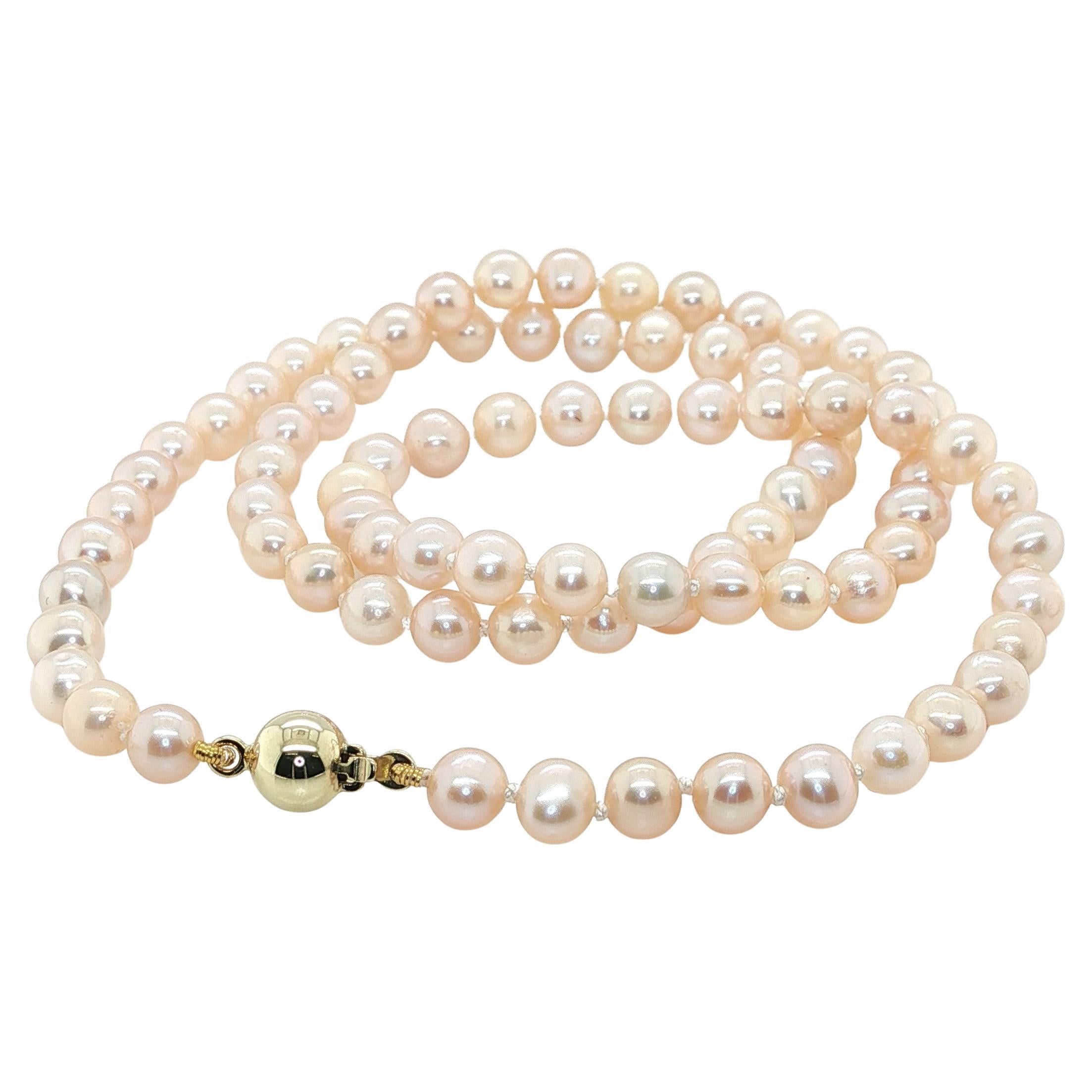 This beautiful 17-inch pearl necklace features gorgeous 4.50 - 4.75mm near-round freshwater pearls with stunning pink color! The pearls are beautifully matched with extraordinary luster, and hand strung on silk thread with knots between each pearl.