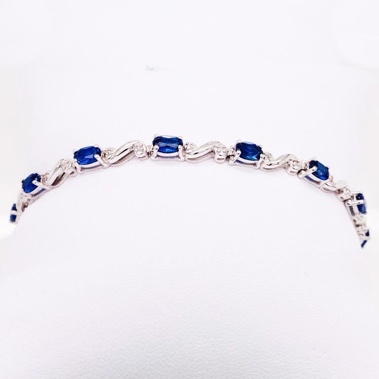 Oval Cut 4.50 Carat Blue Sapphire & 0.16 Carat Diamond Tennis Bracelet in Sterling Silver