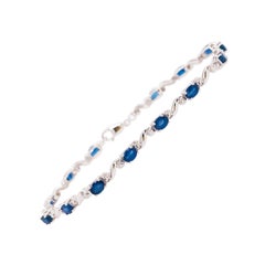 4.50 Carat Blue Sapphire & 0.16 Carat Diamond Tennis Bracelet in Sterling Silver