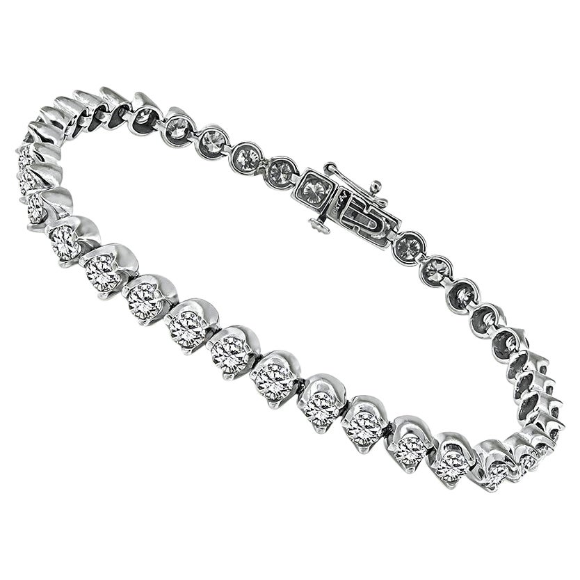 Pulsera de tenis de oro con diamantes de 4.50 quilates en venta