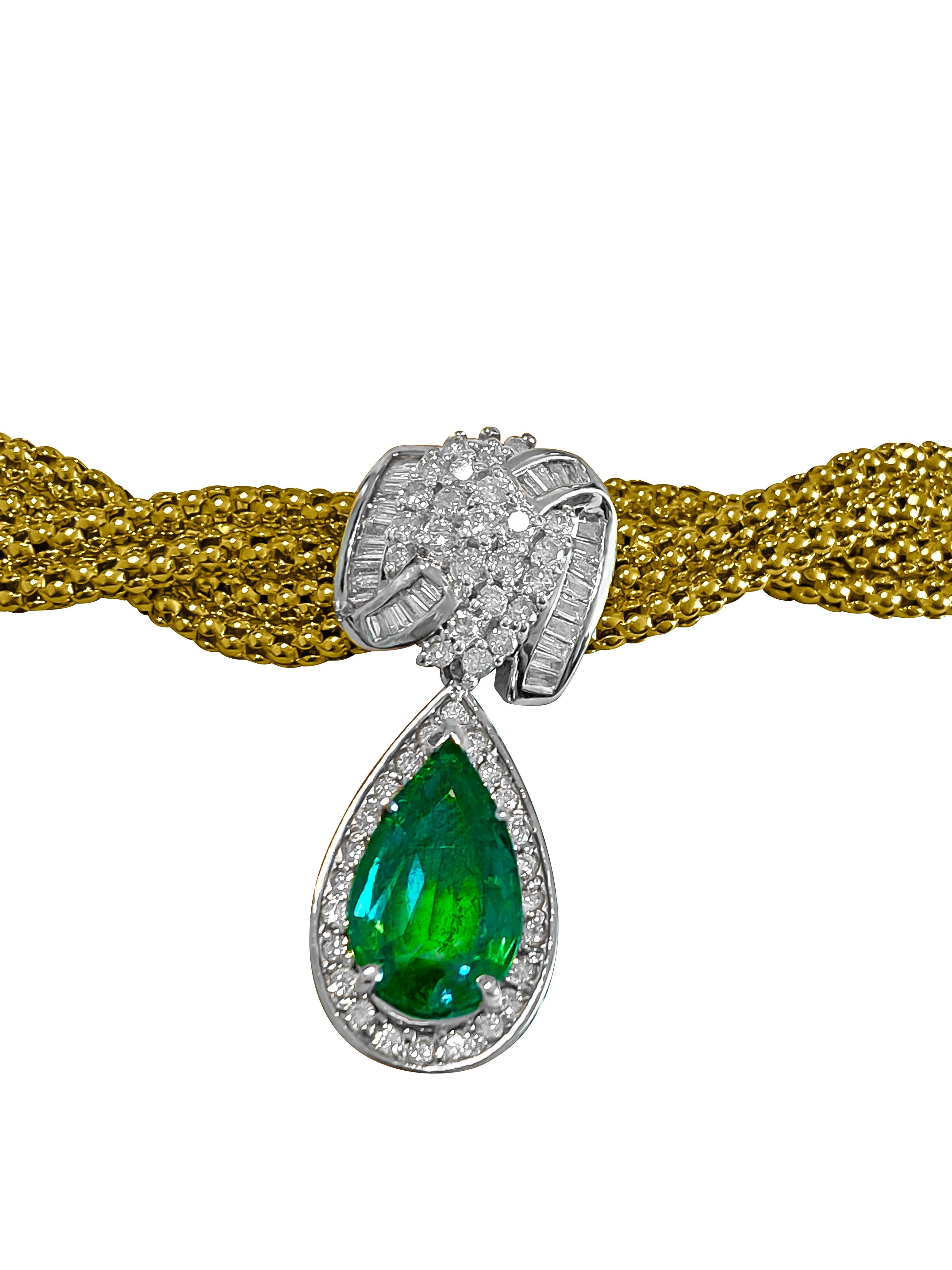 Metal: 14K Yellow Gold. 
4.50 carat pear shape emerald. 100% natural earth mined Colombian emerald, intense green color. Emerald Dimensions: 19.05 x 14.11 mm
3.00 carat diamonds total. Round Brilliant Cut, VS-2 Clarity. F-G Color. 
Necklace